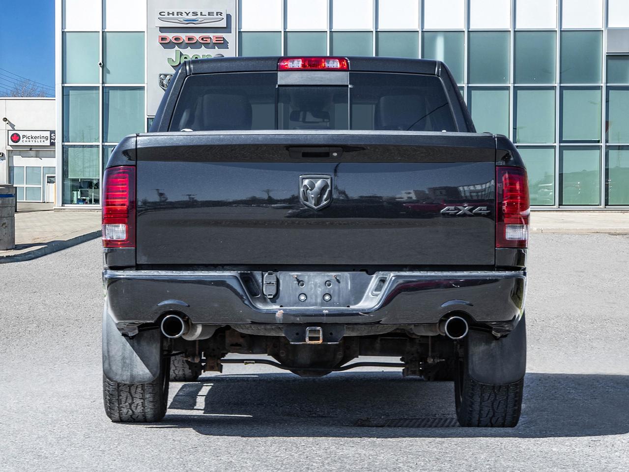 2016 RAM 1500 4WD Crew Cab 140.5  Sport Photo