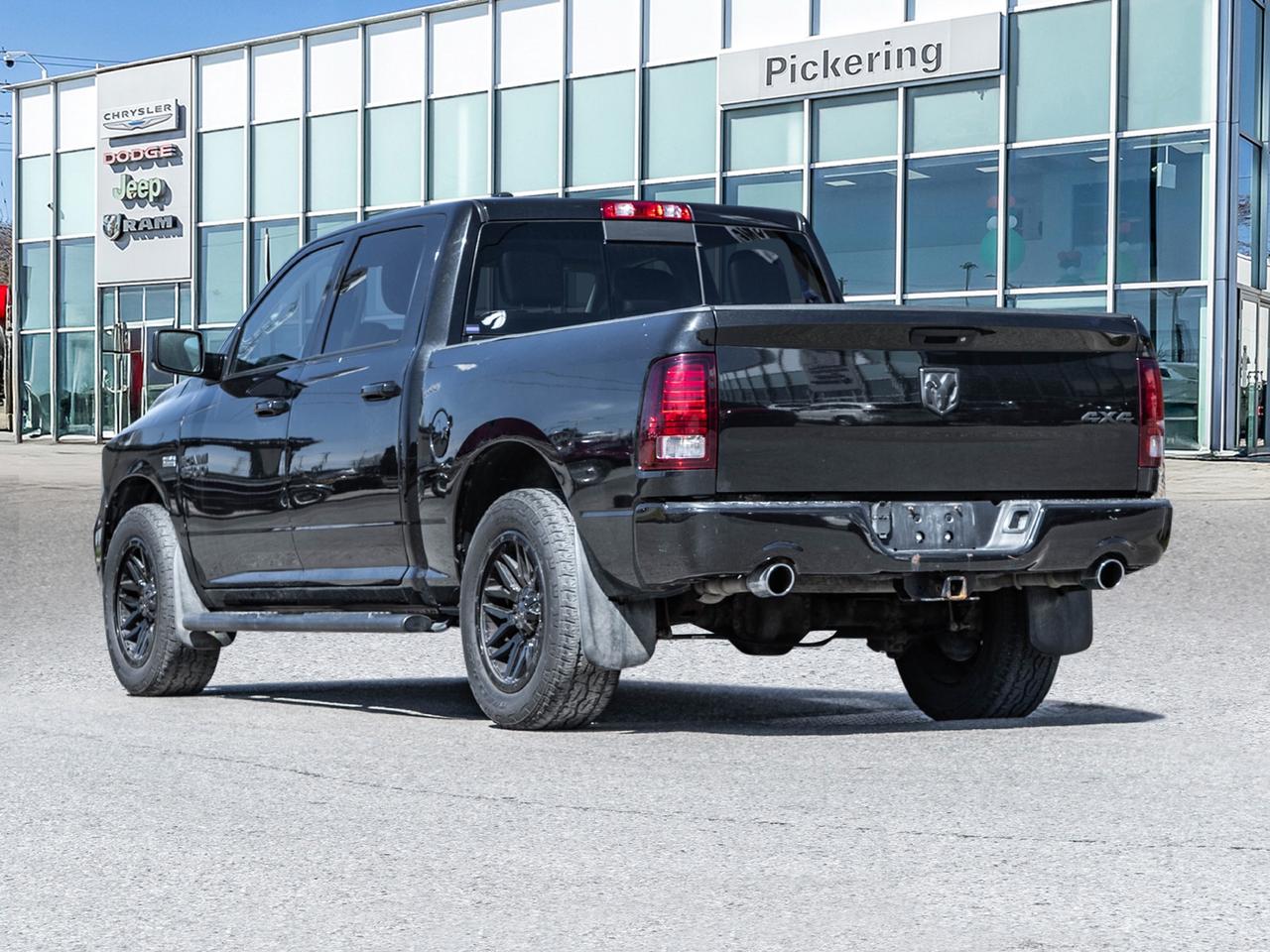 2016 RAM 1500 4WD Crew Cab 140.5  Sport Photo