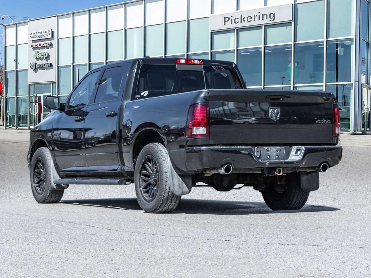 2016 RAM 1500 4WD Crew Cab 140.5  Sport Photo