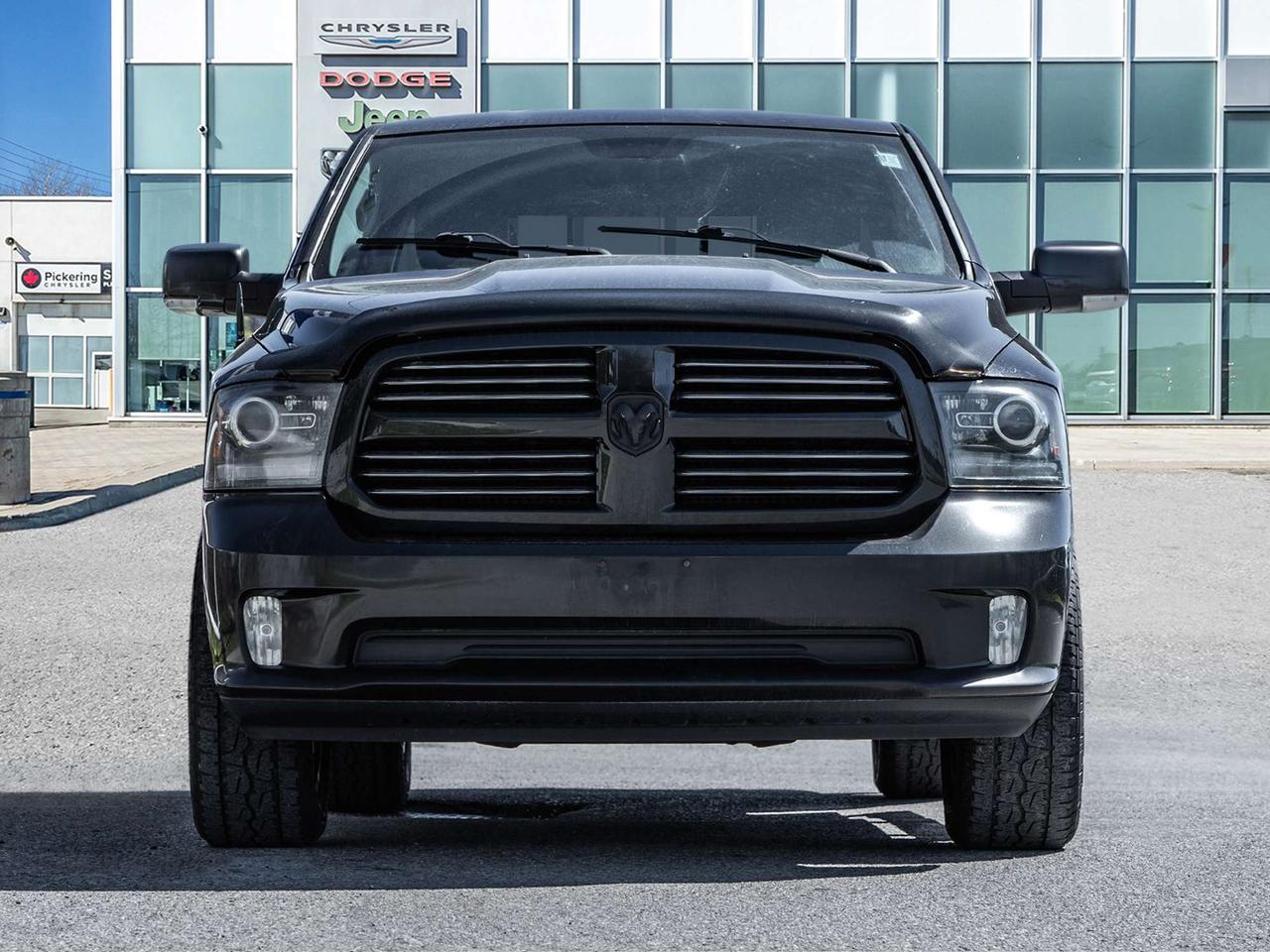 2016 RAM 1500 4WD Crew Cab 140.5  Sport Photo5