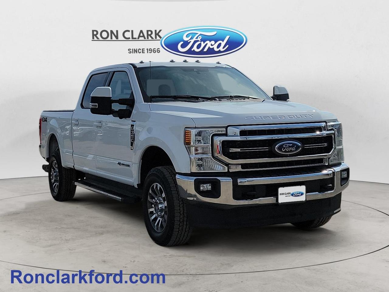 Take on any job with confidence in this well-equipped preowned 2022 Ford F-350 Lariat 4x4 Crew Cab with a 160” wheelbase, finished in classic Oxford White over a refined Black Onyx leather interior. Built for both hard work and everyday comfort, this heavy-duty truck delivers serious capability without sacrificing premium features.Under the hood, you’ll find the legendary 6.7L Power Stroke V8 diesel engine paired with a smooth-shifting 10-speed automatic transmission, offering impressive towing power and dependable performance. Equipped with the 618A Equipment Group and an 11,400 GVWR package, this F-350 is ready to handle demanding workloads while maintaining a composed, confident ride thanks to heavy-duty shocks and the payload downgrade package.This Lariat stands out with a long list of high-end features, including a twin panel moonroof that brightens the cabin, adaptive cruise control for stress-free highway driving, and the Ultimate Trailer Tow Camera System with Pro Trailer Backup Assist—making towing easier and more precise than ever. Roof clearance lights, trailer tow mirrors, integrated trailer brake controller, and a full trailer tow package further enhance its capability.Inside, comfort and technology take center stage. Enjoy power-adjustable front seats, a premium B&O sound system, and Ford’s SYNC 4 system with a large 12-inch touchscreen for seamless connectivity. Convenience features like remote start, keyless entry keypad, universal garage door opener, and a power rear sliding window make everyday use effortless.Additional highlights include running boards for easy access, a tough spray-in bedliner to protect your truck bed, and a rearview camera for added visibility.This F-350 Lariat is the perfect combination of strength, sophistication, and smart technology—ready to tackle tough jobs while keeping you comfortable every step of the way.All Pre-Owned vehicles come standard with one key. If we received additional keys from the previous owner they will be with the vehicle upon delivery at no cost. Additional keys may be purchased at customers request and expense.Come to the dealer you can trust. 60 years and counting Ron Clark Ford & Jayco RV is known for great value and being best in customer service! We serve and deliver all over Ontario including destinations such as Wyoming, Petrolia, Sarnia, London, Guelph, Kitchener-Waterloo, Hamilton, GTA, Ottawa & Chatham-Kent. Call or visit us at RON CLARK FORD & JAYCO RV to view and test drive today! RON CLARK FORD where else!!