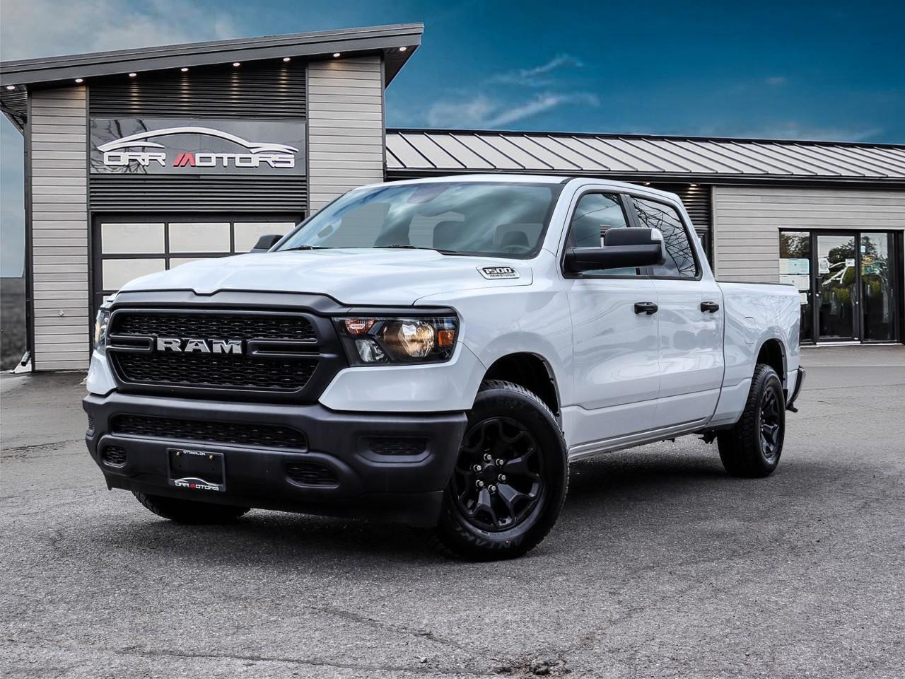<p><strong>2024 Ram 1500 4x4 HEMI V8 | 6 PASSENGER | CREW CAB |TRAILER TOW PACKAGE - CLASS 4 HITCH AND TRAILER BRAKE CONTROL</strong></p><p>Want to tow your camper and take teh whole family? This is the perfect package, 6 passenger seating, Trailer tow package, full power group, blacked out bumpers and alloy wheels, great looking truck! </p><p>Powered by the 5.7L HEMI VVT V8 with FuelSaver MDS and eTorque mild-hybrid assist, producing 395 horsepower and 410 lb-ft of torque, paired with an 8-speed TorqueFlite automatic transmission and 4x4, this truck delivers the torque and towing muscle.</p><p><strong>Key Features:</strong></p><ul><li><p>5.7L HEMI VVT V8 with FuelSaver MDS & eTorque (395 hp / 410 lb-ft)</p></li><li><p>8-Speed TorqueFlite Automatic Transmission</p></li><li><p>4x4 with Electronic Transfer Case</p></li><li><p>Crew Cab with 6'4" Box</p></li><li><p>5" Uconnect 3 Touchscreen with Apple CarPlay & Android Auto</p></li><li><p>6-Speaker Audio System</p></li><li><p>ParkView Rear Backup Camera</p></li><li><p>Cargo Box Lighting</p></li><li><p>Push-Button Start with Keyless Entry</p></li><li><p>Cruise Control with Steering Wheel Controls</p></li><li><p>Air Conditioning</p></li><li><p>Heated & Power-Adjustable Side Mirrors</p></li><li><p>Locking Tailgate</p></li><li><p>Class IV Hitch Receiver with 4-Pin & 7-Pin Trailer Wiring</p></li><li><p>Trailer Sway Control & Electronic Roll Mitigation</p></li><li><p>Heavy-Duty Suspension</p></li><li><p>Hill Start Assist</p></li><li><p>Electronic Stability Control</p></li><li><p>40/20/40 Front Bench Seat (6-Passenger with Rear Fold-Flat Seat)</p></li></ul><p><strong>Fuel Economy (L/100 km):</strong> City: 15.6 · Highway: 10.7 · Combined: 13.4</p><p><strong>Additional Highlights:</strong> Fully Certified & Safety Inspected Financing Available for All Credit Types Extended Warranty Options Available</p><p><strong>Why Buy from Orr Motors Ottawa:</strong> Family-Owned & Operated Dealership Since 1962 Certified & Safety-Inspected Vehicles Competitive Financing Options for All Credit Types Extended Warranty Coverage Available Serving Ottawa, Kanata, Stittsville & Nepean</p><p>Visit us at Orr Motors — 6230 Hazeldean Rd, Ottawa - The Trusted Used Car Dealer in Ottawa Since 1962. Call: 613-836-3333 | <a target=_blank rel=noopener noreferrer nofollow href=http://orrmotors.com>orrmotors.com</a> </p> <br /> <br /> <br /> **Advertised price is for finance purchase. <br /> *Every reasonable effort is made to ensure the accuracy of the information listed above. Vehicle pricing, incentives, options (including standard equipment), and technical specifications listed is for the Year, Make and Model of the vehicle, and may not match the exact vehicle displayed. Please confirm with a sales representative the accuracy of this information.