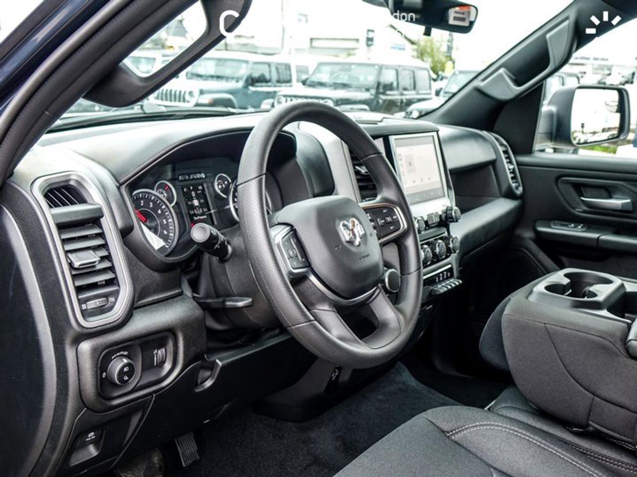 2026 RAM 1500 Express 4x4 Quad Cab 6'4" Box Blind Spot Lane Assist Remote Start 20"Alloy Rims Photo
