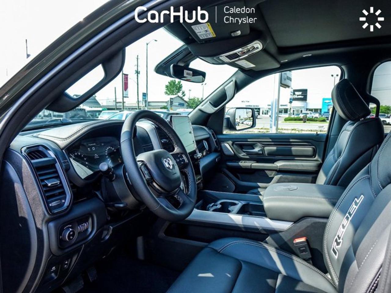 2026 RAM 1500 Rebel 4x4 Crew Cab 5'7" Box 14.4"Display Leather Pano Sunroof Power Tailgate Photo