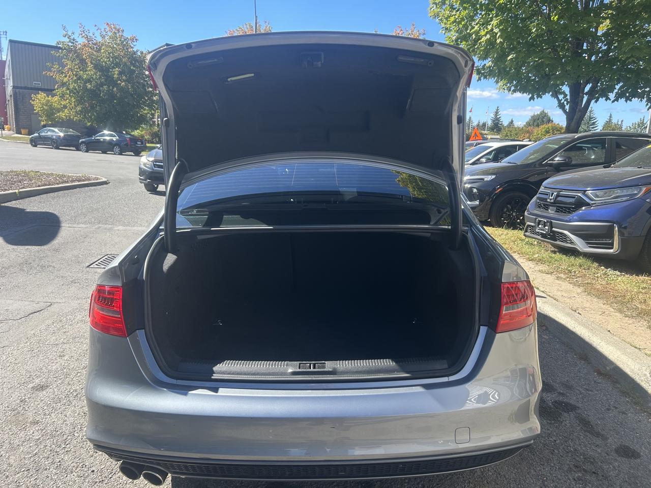 2015 Audi A4 Komfort, AWD, S-line pkg, leather, heated seats! Photo