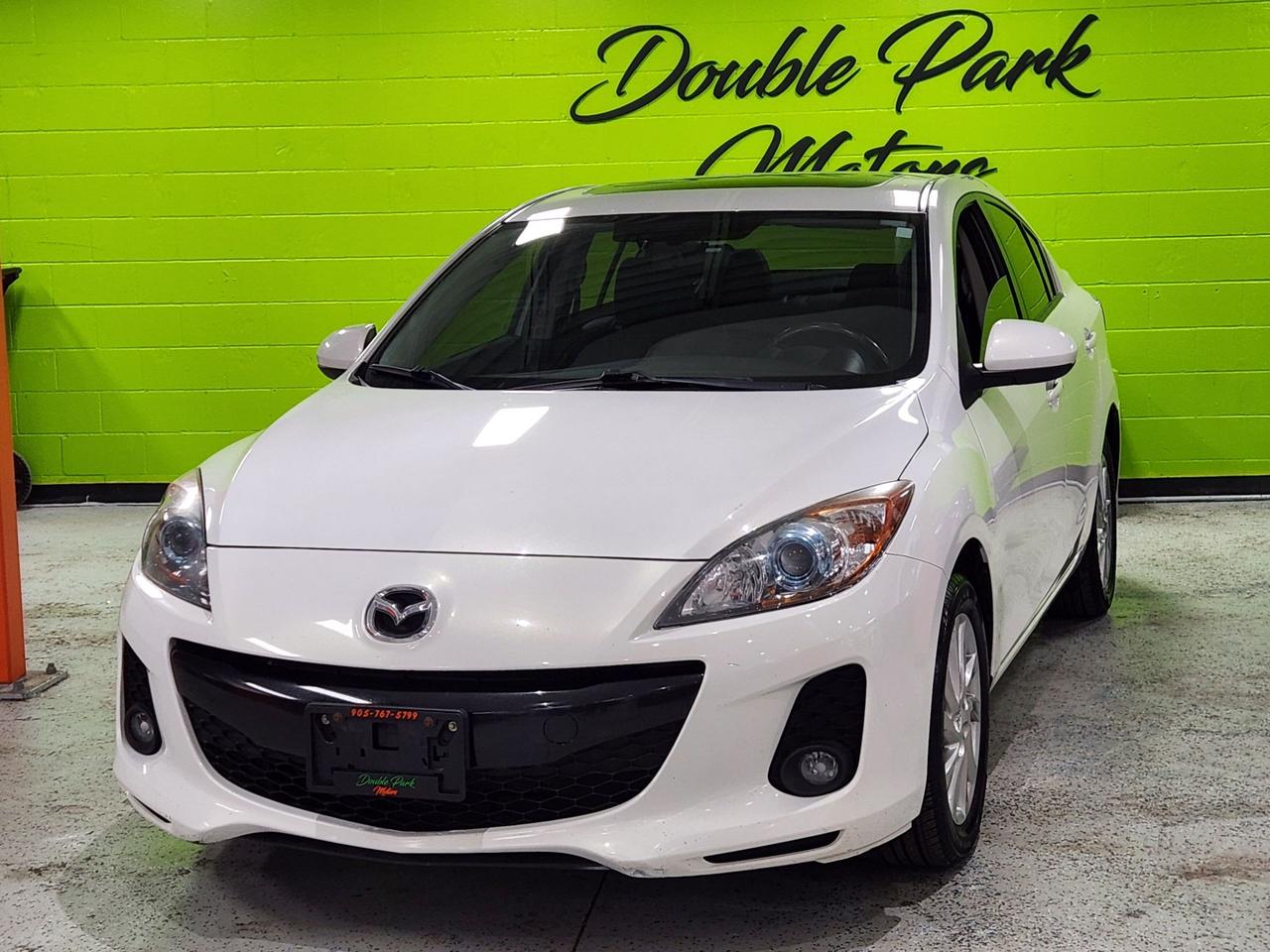 <div id=expanded class=style-scope ytd-text-inline-expander><span class=ytAttributedStringHost ytAttributedStringWhiteSpacePreWrap dir=auto role=text><span class=ytAttributedStringLinkInheritColor dir=auto>2013 Mazda 3 GS-SKY Power Sunroof Leather Seating Push Button Start Automatic Transmission Air Conditioning Cruise Control Alloy Wheels Power Seats Heated Seats Air Conditioning Cruise Control and much more.</span></span></div><div id=snippet class=style-scope ytd-text-inline-expander></div><div class=style-scope ytd-watch-metadata><div id=video-summary class=style-scope ytd-structured-description-content-renderer></div><div id=merch-shelf class=style-scope ytd-structured-description-content-renderer></div><div id=ticket-shelf class=style-scope ytd-structured-description-content-renderer></div><div id=items class=style-scope ytd-structured-description-content-renderer><div id=dismissible class=style-scope ytd-horizontal-card-list-renderer><div id=header-container class=style-scope ytd-horizontal-card-list-renderer><div class=title-row style-scope ytd-rich-list-header-renderer><div id=avatar class=style-scope ytd-rich-list-header-renderer></div><div id=title-text class=style-scope ytd-rich-list-header-renderer></div></div><h2 id=header class=style-scope ytd-horizontal-card-list-renderer></h2></div></div></div></div><p class=MsoNormal style=border: 0px solid #e5e7eb; box-sizing: border-box; --tw-border-spacing-x: 0; --tw-border-spacing-y: 0; --tw-translate-x: 0; --tw-translate-y: 0; --tw-rotate: 0; --tw-skew-x: 0; --tw-skew-y: 0; --tw-scale-x: 1; --tw-scale-y: 1; --tw-scroll-snap-strictness: proximity; --tw-ring-offset-width: 0px; --tw-ring-offset-color: #fff; --tw-ring-color: rgba(59,130,246,.5); --tw-ring-offset-shadow: 0 0 #0000; --tw-ring-shadow: 0 0 #0000; --tw-shadow: 0 0 #0000; --tw-shadow-colored: 0 0 #0000; margin: 0px; font-family: Noto Sans, sans-serif;>Thank you for looking at our inventory, we hope to meet you in person soon. We have an indoor showroom where you can browse and view the vehicles.</p><p class=MsoNormal style=border: 0px solid #e5e7eb; box-sizing: border-box; --tw-border-spacing-x: 0; --tw-border-spacing-y: 0; --tw-translate-x: 0; --tw-translate-y: 0; --tw-rotate: 0; --tw-skew-x: 0; --tw-skew-y: 0; --tw-scale-x: 1; --tw-scale-y: 1; --tw-scroll-snap-strictness: proximity; --tw-ring-offset-width: 0px; --tw-ring-offset-color: #fff; --tw-ring-color: rgba(59,130,246,.5); --tw-ring-offset-shadow: 0 0 #0000; --tw-ring-shadow: 0 0 #0000; --tw-shadow: 0 0 #0000; --tw-shadow-colored: 0 0 #0000; margin: 0px; font-family: Noto Sans, sans-serif;>A Video of the vehicle you are looking at is available on our website,&nbsp;<a style=border: 0px solid #e5e7eb; box-sizing: border-box; --tw-border-spacing-x: 0; --tw-border-spacing-y: 0; --tw-translate-x: 0; --tw-translate-y: 0; --tw-rotate: 0; --tw-skew-x: 0; --tw-skew-y: 0; --tw-scale-x: 1; --tw-scale-y: 1; --tw-scroll-snap-strictness: proximity; --tw-ring-offset-width: 0px; --tw-ring-offset-color: #fff; --tw-ring-color: rgba(59,130,246,.5); --tw-ring-offset-shadow: 0 0 #0000; --tw-ring-shadow: 0 0 #0000; --tw-shadow: 0 0 #0000; --tw-shadow-colored: 0 0 #0000; text-decoration: inherit; href=http://www.doubleparkmotors.ca/>www.doubleparkmotors.ca</a></p><p class=MsoNormal style=border: 0px solid #e5e7eb; box-sizing: border-box; --tw-border-spacing-x: 0; --tw-border-spacing-y: 0; --tw-translate-x: 0; --tw-translate-y: 0; --tw-rotate: 0; --tw-skew-x: 0; --tw-skew-y: 0; --tw-scale-x: 1; --tw-scale-y: 1; --tw-scroll-snap-strictness: proximity; --tw-ring-offset-width: 0px; --tw-ring-offset-color: #fff; --tw-ring-color: rgba(59,130,246,.5); --tw-ring-offset-shadow: 0 0 #0000; --tw-ring-shadow: 0 0 #0000; --tw-shadow: 0 0 #0000; --tw-shadow-colored: 0 0 #0000; margin: 0px; font-family: Noto Sans, sans-serif;>Feel free to call or email any questions you may have, we will be more than happy to help.</p><p class=MsoNormal style=border: 0px solid #e5e7eb; box-sizing: border-box; --tw-border-spacing-x: 0; --tw-border-spacing-y: 0; --tw-translate-x: 0; --tw-translate-y: 0; --tw-rotate: 0; --tw-skew-x: 0; --tw-skew-y: 0; --tw-scale-x: 1; --tw-scale-y: 1; --tw-scroll-snap-strictness: proximity; --tw-ring-offset-width: 0px; --tw-ring-offset-color: #fff; --tw-ring-color: rgba(59,130,246,.5); --tw-ring-offset-shadow: 0 0 #0000; --tw-ring-shadow: 0 0 #0000; --tw-shadow: 0 0 #0000; --tw-shadow-colored: 0 0 #0000; margin: 0px; font-family: Noto Sans, sans-serif;>Financing is Available. We have Credit specialists that will help secure the best possible rate for you.&nbsp;<span style=border: 0px solid #e5e7eb; box-sizing: border-box; --tw-border-spacing-x: 0; --tw-border-spacing-y: 0; --tw-translate-x: 0; --tw-translate-y: 0; --tw-rotate: 0; --tw-skew-x: 0; --tw-skew-y: 0; --tw-scale-x: 1; --tw-scale-y: 1; --tw-scroll-snap-strictness: proximity; --tw-ring-offset-width: 0px; --tw-ring-offset-color: #fff; --tw-ring-color: rgba(59,130,246,.5); --tw-ring-offset-shadow: 0 0 #0000; --tw-ring-shadow: 0 0 #0000; --tw-shadow: 0 0 #0000; --tw-shadow-colored: 0 0 #0000;>&nbsp;</span></p><p class=MsoNormal style=border: 0px solid #e5e7eb; box-sizing: border-box; --tw-border-spacing-x: 0; --tw-border-spacing-y: 0; --tw-translate-x: 0; --tw-translate-y: 0; --tw-rotate: 0; --tw-skew-x: 0; --tw-skew-y: 0; --tw-scale-x: 1; --tw-scale-y: 1; --tw-scroll-snap-strictness: proximity; --tw-ring-offset-width: 0px; --tw-ring-offset-color: #fff; --tw-ring-color: rgba(59,130,246,.5); --tw-ring-offset-shadow: 0 0 #0000; --tw-ring-shadow: 0 0 #0000; --tw-shadow: 0 0 #0000; --tw-shadow-colored: 0 0 #0000; margin: 0px; font-family: Noto Sans, sans-serif;>For our Commercial Clients, Commercial Leasing is available.</p><p class=MsoNormal style=border: 0px solid #e5e7eb; box-sizing: border-box; --tw-border-spacing-x: 0; --tw-border-spacing-y: 0; --tw-translate-x: 0; --tw-translate-y: 0; --tw-rotate: 0; --tw-skew-x: 0; --tw-skew-y: 0; --tw-scale-x: 1; --tw-scale-y: 1; --tw-scroll-snap-strictness: proximity; --tw-ring-offset-width: 0px; --tw-ring-offset-color: #fff; --tw-ring-color: rgba(59,130,246,.5); --tw-ring-offset-shadow: 0 0 #0000; --tw-ring-shadow: 0 0 #0000; --tw-shadow: 0 0 #0000; --tw-shadow-colored: 0 0 #0000; margin: 0px; font-family: Noto Sans, sans-serif;>We Accept Trade in&rsquo;s</p><p class=MsoNormal style=border: 0px solid #e5e7eb; box-sizing: border-box; --tw-border-spacing-x: 0; --tw-border-spacing-y: 0; --tw-translate-x: 0; --tw-translate-y: 0; --tw-rotate: 0; --tw-skew-x: 0; --tw-skew-y: 0; --tw-scale-x: 1; --tw-scale-y: 1; --tw-scroll-snap-strictness: proximity; --tw-ring-offset-width: 0px; --tw-ring-offset-color: #fff; --tw-ring-color: rgba(59,130,246,.5); --tw-ring-offset-shadow: 0 0 #0000; --tw-ring-shadow: 0 0 #0000; --tw-shadow: 0 0 #0000; --tw-shadow-colored: 0 0 #0000; margin: 0px; font-family: Noto Sans, sans-serif;><span style=border: 0px solid #e5e7eb; box-sizing: border-box; --tw-border-spacing-x: 0; --tw-border-spacing-y: 0; --tw-translate-x: 0; --tw-translate-y: 0; --tw-rotate: 0; --tw-skew-x: 0; --tw-skew-y: 0; --tw-scale-x: 1; --tw-scale-y: 1; --tw-scroll-snap-strictness: proximity; --tw-ring-offset-width: 0px; --tw-ring-offset-color: #fff; --tw-ring-color: rgba(59,130,246,.5); --tw-ring-offset-shadow: 0 0 #0000; --tw-ring-shadow: 0 0 #0000; --tw-shadow: 0 0 #0000; --tw-shadow-colored: 0 0 #0000;>Our team of Automotive Finance specialists have extensive experience; they will work all avenues to get you approved. Extensive knowledge and Connections within the Automotive Finance Industry allow us to get you approved when others can&rsquo;t.</span></p><p class=MsoNormal style=border: 0px solid #e5e7eb; box-sizing: border-box; --tw-border-spacing-x: 0; --tw-border-spacing-y: 0; --tw-translate-x: 0; --tw-translate-y: 0; --tw-rotate: 0; --tw-skew-x: 0; --tw-skew-y: 0; --tw-scale-x: 1; --tw-scale-y: 1; --tw-scroll-snap-strictness: proximity; --tw-ring-offset-width: 0px; --tw-ring-offset-color: #fff; --tw-ring-color: rgba(59,130,246,.5); --tw-ring-offset-shadow: 0 0 #0000; --tw-ring-shadow: 0 0 #0000; --tw-shadow: 0 0 #0000; --tw-shadow-colored: 0 0 #0000; margin: 0px; font-family: Noto Sans, sans-serif;><span style=border: 0px solid #e5e7eb; box-sizing: border-box; --tw-border-spacing-x: 0; --tw-border-spacing-y: 0; --tw-translate-x: 0; --tw-translate-y: 0; --tw-rotate: 0; --tw-skew-x: 0; --tw-skew-y: 0; --tw-scale-x: 1; --tw-scale-y: 1; --tw-scroll-snap-strictness: proximity; --tw-ring-offset-width: 0px; --tw-ring-offset-color: #fff; --tw-ring-color: rgba(59,130,246,.5); --tw-ring-offset-shadow: 0 0 #0000; --tw-ring-shadow: 0 0 #0000; --tw-shadow: 0 0 #0000; --tw-shadow-colored: 0 0 #0000;>We are experienced in all the Below Areas and More:</span></p><p style=border: 0px solid #e5e7eb; box-sizing: border-box; --tw-border-spacing-x: 0; --tw-border-spacing-y: 0; --tw-translate-x: 0; --tw-translate-y: 0; --tw-rotate: 0; --tw-skew-x: 0; --tw-skew-y: 0; --tw-scale-x: 1; --tw-scale-y: 1; --tw-scroll-snap-strictness: proximity; --tw-ring-offset-width: 0px; --tw-ring-offset-color: #fff; --tw-ring-color: rgba(59,130,246,.5); --tw-ring-offset-shadow: 0 0 #0000; --tw-ring-shadow: 0 0 #0000; --tw-shadow: 0 0 #0000; --tw-shadow-colored: 0 0 #0000; margin: 0px; font-family: Noto Sans, sans-serif;><span style=border: 0px solid #e5e7eb; box-sizing: border-box; --tw-border-spacing-x: 0; --tw-border-spacing-y: 0; --tw-translate-x: 0; --tw-translate-y: 0; --tw-rotate: 0; --tw-skew-x: 0; --tw-skew-y: 0; --tw-scale-x: 1; --tw-scale-y: 1; --tw-scroll-snap-strictness: proximity; --tw-ring-offset-width: 0px; --tw-ring-offset-color: #fff; --tw-ring-color: rgba(59,130,246,.5); --tw-ring-offset-shadow: 0 0 #0000; --tw-ring-shadow: 0 0 #0000; --tw-shadow: 0 0 #0000; --tw-shadow-colored: 0 0 #0000; font-size: 11pt;>Bad Credit, Divorce, No Credit, Collections, Bankruptcy or Consumer Proposal, New to Canada, First Time Buyer, Rebuilding Credit. High TDSR, Lower Your Payments. Let us help your credit get back on track</span></p><p class=MsoNormal style=border: 0px solid #e5e7eb; box-sizing: border-box; --tw-border-spacing-x: 0; --tw-border-spacing-y: 0; --tw-translate-x: 0; --tw-translate-y: 0; --tw-rotate: 0; --tw-skew-x: 0; --tw-skew-y: 0; --tw-scale-x: 1; --tw-scale-y: 1; --tw-scroll-snap-strictness: proximity; --tw-ring-offset-width: 0px; --tw-ring-offset-color: #fff; --tw-ring-color: rgba(59,130,246,.5); --tw-ring-offset-shadow: 0 0 #0000; --tw-ring-shadow: 0 0 #0000; --tw-shadow: 0 0 #0000; --tw-shadow-colored: 0 0 #0000; margin: 0px; font-family: Noto Sans, sans-serif;>Located At 1035 Brock Road Unit 1, Pickering Ontario</p><p class=MsoNormal style=border: 0px solid #e5e7eb; box-sizing: border-box; --tw-border-spacing-x: 0; --tw-border-spacing-y: 0; --tw-translate-x: 0; --tw-translate-y: 0; --tw-rotate: 0; --tw-skew-x: 0; --tw-skew-y: 0; --tw-scale-x: 1; --tw-scale-y: 1; --tw-scroll-snap-strictness: proximity; --tw-ring-offset-width: 0px; --tw-ring-offset-color: #fff; --tw-ring-color: rgba(59,130,246,.5); --tw-ring-offset-shadow: 0 0 #0000; --tw-ring-shadow: 0 0 #0000; --tw-shadow: 0 0 #0000; --tw-shadow-colored: 0 0 #0000; margin: 0px; font-family: Noto Sans, sans-serif;>Hours</p><p class=MsoNormal style=border: 0px solid #e5e7eb; box-sizing: border-box; --tw-border-spacing-x: 0; --tw-border-spacing-y: 0; --tw-translate-x: 0; --tw-translate-y: 0; --tw-rotate: 0; --tw-skew-x: 0; --tw-skew-y: 0; --tw-scale-x: 1; --tw-scale-y: 1; --tw-scroll-snap-strictness: proximity; --tw-ring-offset-width: 0px; --tw-ring-offset-color: #fff; --tw-ring-color: rgba(59,130,246,.5); --tw-ring-offset-shadow: 0 0 #0000; --tw-ring-shadow: 0 0 #0000; --tw-shadow: 0 0 #0000; --tw-shadow-colored: 0 0 #0000; margin: 0px; font-family: Noto Sans, sans-serif;>Monday<span style=border: 0px solid #e5e7eb; box-sizing: border-box; --tw-border-spacing-x: 0; --tw-border-spacing-y: 0; --tw-translate-x: 0; --tw-translate-y: 0; --tw-rotate: 0; --tw-skew-x: 0; --tw-skew-y: 0; --tw-scale-x: 1; --tw-scale-y: 1; --tw-scroll-snap-strictness: proximity; --tw-ring-offset-width: 0px; --tw-ring-offset-color: #fff; --tw-ring-color: rgba(59,130,246,.5); --tw-ring-offset-shadow: 0 0 #0000; --tw-ring-shadow: 0 0 #0000; --tw-shadow: 0 0 #0000; --tw-shadow-colored: 0 0 #0000;>&nbsp;&nbsp;</span><span style=border: 0px solid #e5e7eb; box-sizing: border-box; --tw-border-spacing-x: 0; --tw-border-spacing-y: 0; --tw-translate-x: 0; --tw-translate-y: 0; --tw-rotate: 0; --tw-skew-x: 0; --tw-skew-y: 0; --tw-scale-x: 1; --tw-scale-y: 1; --tw-scroll-snap-strictness: proximity; --tw-ring-offset-width: 0px; --tw-ring-offset-color: #fff; --tw-ring-color: rgba(59,130,246,.5); --tw-ring-offset-shadow: 0 0 #0000; --tw-ring-shadow: 0 0 #0000; --tw-shadow: 0 0 #0000; --tw-shadow-colored: 0 0 #0000;>&nbsp;&nbsp;&nbsp;&nbsp;&nbsp;&nbsp;&nbsp;&nbsp;&nbsp;&nbsp;&nbsp;</span>9:30am - 6:30pm</p><p class=MsoNormal style=border: 0px solid #e5e7eb; box-sizing: border-box; --tw-border-spacing-x: 0; --tw-border-spacing-y: 0; --tw-translate-x: 0; --tw-translate-y: 0; --tw-rotate: 0; --tw-skew-x: 0; --tw-skew-y: 0; --tw-scale-x: 1; --tw-scale-y: 1; --tw-scroll-snap-strictness: proximity; --tw-ring-offset-width: 0px; --tw-ring-offset-color: #fff; --tw-ring-color: rgba(59,130,246,.5); --tw-ring-offset-shadow: 0 0 #0000; --tw-ring-shadow: 0 0 #0000; --tw-shadow: 0 0 #0000; --tw-shadow-colored: 0 0 #0000; margin: 0px; font-family: Noto Sans, sans-serif;>Tuesday<span style=border: 0px solid #e5e7eb; box-sizing: border-box; --tw-border-spacing-x: 0; --tw-border-spacing-y: 0; --tw-translate-x: 0; --tw-translate-y: 0; --tw-rotate: 0; --tw-skew-x: 0; --tw-skew-y: 0; --tw-scale-x: 1; --tw-scale-y: 1; --tw-scroll-snap-strictness: proximity; --tw-ring-offset-width: 0px; --tw-ring-offset-color: #fff; --tw-ring-color: rgba(59,130,246,.5); --tw-ring-offset-shadow: 0 0 #0000; --tw-ring-shadow: 0 0 #0000; --tw-shadow: 0 0 #0000; --tw-shadow-colored: 0 0 #0000;>&nbsp;&nbsp;</span><span style=border: 0px solid #e5e7eb; box-sizing: border-box; --tw-border-spacing-x: 0; --tw-border-spacing-y: 0; --tw-translate-x: 0; --tw-translate-y: 0; --tw-rotate: 0; --tw-skew-x: 0; --tw-skew-y: 0; --tw-scale-x: 1; --tw-scale-y: 1; --tw-scroll-snap-strictness: proximity; --tw-ring-offset-width: 0px; --tw-ring-offset-color: #fff; --tw-ring-color: rgba(59,130,246,.5); --tw-ring-offset-shadow: 0 0 #0000; --tw-ring-shadow: 0 0 #0000; --tw-shadow: 0 0 #0000; --tw-shadow-colored: 0 0 #0000;>&nbsp;&nbsp;&nbsp;&nbsp;&nbsp;&nbsp;&nbsp;&nbsp;&nbsp;&nbsp;&nbsp;</span>9:30am - 6:30pm</p><p class=MsoNormal style=border: 0px solid #e5e7eb; box-sizing: border-box; --tw-border-spacing-x: 0; --tw-border-spacing-y: 0; --tw-translate-x: 0; --tw-translate-y: 0; --tw-rotate: 0; --tw-skew-x: 0; --tw-skew-y: 0; --tw-scale-x: 1; --tw-scale-y: 1; --tw-scroll-snap-strictness: proximity; --tw-ring-offset-width: 0px; --tw-ring-offset-color: #fff; --tw-ring-color: rgba(59,130,246,.5); --tw-ring-offset-shadow: 0 0 #0000; --tw-ring-shadow: 0 0 #0000; --tw-shadow: 0 0 #0000; --tw-shadow-colored: 0 0 #0000; margin: 0px; font-family: Noto Sans, sans-serif;>Wednesday<span style=border: 0px solid #e5e7eb; box-sizing: border-box; --tw-border-spacing-x: 0; --tw-border-spacing-y: 0; --tw-translate-x: 0; --tw-translate-y: 0; --tw-rotate: 0; --tw-skew-x: 0; --tw-skew-y: 0; --tw-scale-x: 1; --tw-scale-y: 1; --tw-scroll-snap-strictness: proximity; --tw-ring-offset-width: 0px; --tw-ring-offset-color: #fff; --tw-ring-color: rgba(59,130,246,.5); --tw-ring-offset-shadow: 0 0 #0000; --tw-ring-shadow: 0 0 #0000; --tw-shadow: 0 0 #0000; --tw-shadow-colored: 0 0 #0000;>&nbsp; &nbsp; &nbsp; &nbsp; </span>9:30am &ndash; 6:30pm</p><p class=MsoNormal style=border: 0px solid #e5e7eb; box-sizing: border-box; --tw-border-spacing-x: 0; --tw-border-spacing-y: 0; --tw-translate-x: 0; --tw-translate-y: 0; --tw-rotate: 0; --tw-skew-x: 0; --tw-skew-y: 0; --tw-scale-x: 1; --tw-scale-y: 1; --tw-scroll-snap-strictness: proximity; --tw-ring-offset-width: 0px; --tw-ring-offset-color: #fff; --tw-ring-color: rgba(59,130,246,.5); --tw-ring-offset-shadow: 0 0 #0000; --tw-ring-shadow: 0 0 #0000; --tw-shadow: 0 0 #0000; --tw-shadow-colored: 0 0 #0000; margin: 0px; font-family: Noto Sans, sans-serif;>Thursday<span style=border: 0px solid #e5e7eb; box-sizing: border-box; --tw-border-spacing-x: 0; --tw-border-spacing-y: 0; --tw-translate-x: 0; --tw-translate-y: 0; --tw-rotate: 0; --tw-skew-x: 0; --tw-skew-y: 0; --tw-scale-x: 1; --tw-scale-y: 1; --tw-scroll-snap-strictness: proximity; --tw-ring-offset-width: 0px; --tw-ring-offset-color: #fff; --tw-ring-color: rgba(59,130,246,.5); --tw-ring-offset-shadow: 0 0 #0000; --tw-ring-shadow: 0 0 #0000; --tw-shadow: 0 0 #0000; --tw-shadow-colored: 0 0 #0000;> &nbsp;&nbsp;&nbsp;&nbsp;&nbsp;&nbsp;&nbsp;&nbsp;&nbsp;&nbsp; </span>9:30am &ndash; 6:30pm</p><p class=MsoNormal style=border: 0px solid #e5e7eb; box-sizing: border-box; --tw-border-spacing-x: 0; --tw-border-spacing-y: 0; --tw-translate-x: 0; --tw-translate-y: 0; --tw-rotate: 0; --tw-skew-x: 0; --tw-skew-y: 0; --tw-scale-x: 1; --tw-scale-y: 1; --tw-scroll-snap-strictness: proximity; --tw-ring-offset-width: 0px; --tw-ring-offset-color: #fff; --tw-ring-color: rgba(59,130,246,.5); --tw-ring-offset-shadow: 0 0 #0000; --tw-ring-shadow: 0 0 #0000; --tw-shadow: 0 0 #0000; --tw-shadow-colored: 0 0 #0000; margin: 0px; font-family: Noto Sans, sans-serif;>Friday<span style=border: 0px solid #e5e7eb; box-sizing: border-box; --tw-border-spacing-x: 0; --tw-border-spacing-y: 0; --tw-translate-x: 0; --tw-translate-y: 0; --tw-rotate: 0; --tw-skew-x: 0; --tw-skew-y: 0; --tw-scale-x: 1; --tw-scale-y: 1; --tw-scroll-snap-strictness: proximity; --tw-ring-offset-width: 0px; --tw-ring-offset-color: #fff; --tw-ring-color: rgba(59,130,246,.5); --tw-ring-offset-shadow: 0 0 #0000; --tw-ring-shadow: 0 0 #0000; --tw-shadow: 0 0 #0000; --tw-shadow-colored: 0 0 #0000;> &nbsp;&nbsp;&nbsp;&nbsp;&nbsp;&nbsp;&nbsp;&nbsp;&nbsp;&nbsp;&nbsp;&nbsp;&nbsp;&nbsp;&nbsp;&nbsp;</span>9:00am &ndash; 5:30pm</p><p class=MsoNormal style=border: 0px solid #e5e7eb; box-sizing: border-box; --tw-border-spacing-x: 0; --tw-border-spacing-y: 0; --tw-translate-x: 0; --tw-translate-y: 0; --tw-rotate: 0; --tw-skew-x: 0; --tw-skew-y: 0; --tw-scale-x: 1; --tw-scale-y: 1; --tw-scroll-snap-strictness: proximity; --tw-ring-offset-width: 0px; --tw-ring-offset-color: #fff; --tw-ring-color: rgba(59,130,246,.5); --tw-ring-offset-shadow: 0 0 #0000; --tw-ring-shadow: 0 0 #0000; --tw-shadow: 0 0 #0000; --tw-shadow-colored: 0 0 #0000; margin: 0px; font-family: Noto Sans, sans-serif;>Saturday<span style=border: 0px solid #e5e7eb; box-sizing: border-box; --tw-border-spacing-x: 0; --tw-border-spacing-y: 0; --tw-translate-x: 0; --tw-translate-y: 0; --tw-rotate: 0; --tw-skew-x: 0; --tw-skew-y: 0; --tw-scale-x: 1; --tw-scale-y: 1; --tw-scroll-snap-strictness: proximity; --tw-ring-offset-width: 0px; --tw-ring-offset-color: #fff; --tw-ring-color: rgba(59,130,246,.5); --tw-ring-offset-shadow: 0 0 #0000; --tw-ring-shadow: 0 0 #0000; --tw-shadow: 0 0 #0000; --tw-shadow-colored: 0 0 #0000;> &nbsp;&nbsp;&nbsp;&nbsp;&nbsp;&nbsp;&nbsp;&nbsp;&nbsp;&nbsp;&nbsp;&nbsp;</span>9:00am &ndash; 4:00pm</p><p class=MsoNormal style=border: 0px solid #e5e7eb; box-sizing: border-box; --tw-border-spacing-x: 0; --tw-border-spacing-y: 0; --tw-translate-x: 0; --tw-translate-y: 0; --tw-rotate: 0; --tw-skew-x: 0; --tw-skew-y: 0; --tw-scale-x: 1; --tw-scale-y: 1; --tw-scroll-snap-strictness: proximity; --tw-ring-offset-width: 0px; --tw-ring-offset-color: #fff; --tw-ring-color: rgba(59,130,246,.5); --tw-ring-offset-shadow: 0 0 #0000; --tw-ring-shadow: 0 0 #0000; --tw-shadow: 0 0 #0000; --tw-shadow-colored: 0 0 #0000; margin: 0px; font-family: Noto Sans, sans-serif;>Sunday&nbsp;<span style=border: 0px solid #e5e7eb; box-sizing: border-box; --tw-border-spacing-x: 0; --tw-border-spacing-y: 0; --tw-translate-x: 0; --tw-translate-y: 0; --tw-rotate: 0; --tw-skew-x: 0; --tw-skew-y: 0; --tw-scale-x: 1; --tw-scale-y: 1; --tw-scroll-snap-strictness: proximity; --tw-ring-offset-width: 0px; --tw-ring-offset-color: #fff; --tw-ring-color: rgba(59,130,246,.5); --tw-ring-offset-shadow: 0 0 #0000; --tw-ring-shadow: 0 0 #0000; --tw-shadow: 0 0 #0000; --tw-shadow-colored: 0 0 #0000;>&nbsp; &nbsp; &nbsp; &nbsp; &nbsp; &nbsp; &nbsp; 11:00am- 3:00pm</span></p>