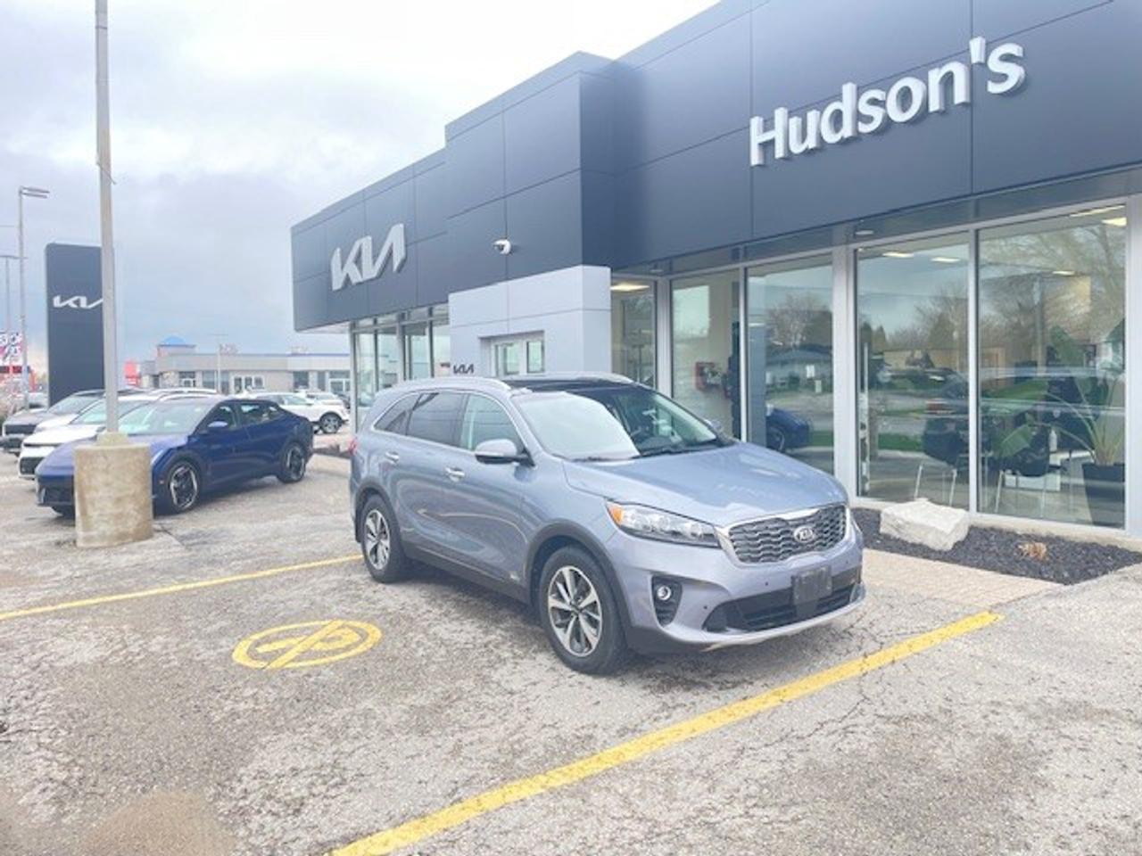 <p>One Owner! This Sorento features a 3.3L V6 GDI Engine, 6-Speed Automatic Transmission, Drive Mode Select, Everlasting Grey Exterior, Black Leather Interior, Panoramic Sunroof, Heated Front Bucket Seats, 14-Way Power Driver's Seat w/ 4-Way Power Lumbar Controls, Driver's Seat Memory Control Settings, Power Passenger Seat, 50/50 Fold into Floor 3rd Row Seats, Keyless Entry, Smart Key, Push Button Start, Power Windows/Door Locks, Rear View Camera, Front/Rear Parking Sensors, Blind Spot Detection, Rear Cross Traffic Alert, Heated Tilt / Telescopic Leather Wrapped Steering Wheel w/ Audio Controls, AM/FM/MP3 Stereo, Bluetooth Hands-Free Connectivity, Android Auto/Apple CarPlay® Equipped, 7" Audio Display, UVO Intelligence, Wireless Phone Charging, 110V Power Outlet, USB/AUX Ports, Air Conditioning, Dual Zone Auto Climate Controls, Rear Climate Ventilation, Power Heated Side View Mirrors w/ Signal Repeaters, Windshield Wiper De-Icer, Electronic Stability Control, Vehicle Stability Management, Hill Start Assist, Cruise Control, Projection Headlights, Roof Rails, Front Fog Lights, LED Interior Lighting, Gloss Grille, Silver Bumper Accents, Rear Spoiler, Trailer Lighting Pre-Wiring, Weather Tech Floor Mats, Splash Guards, 18" Machined-Finish Alloy Wheels, SiriusXM Satellite Radio Services Available.</p><p></p><p><em>The Larry Hudson Group is a family run automotive organization that has enjoyed growth for over 42 years of business. We have a great selection of new inventory and what we feel are the best reconditioned used cars in Ontario. Hudsons NEED your trade. We can offer you top market value for your current vehicle. Please come and partake in a great buying experience with the Larry Hudson Group in Listowel. FREE CarFax report available with every used vehicle!</em></p>