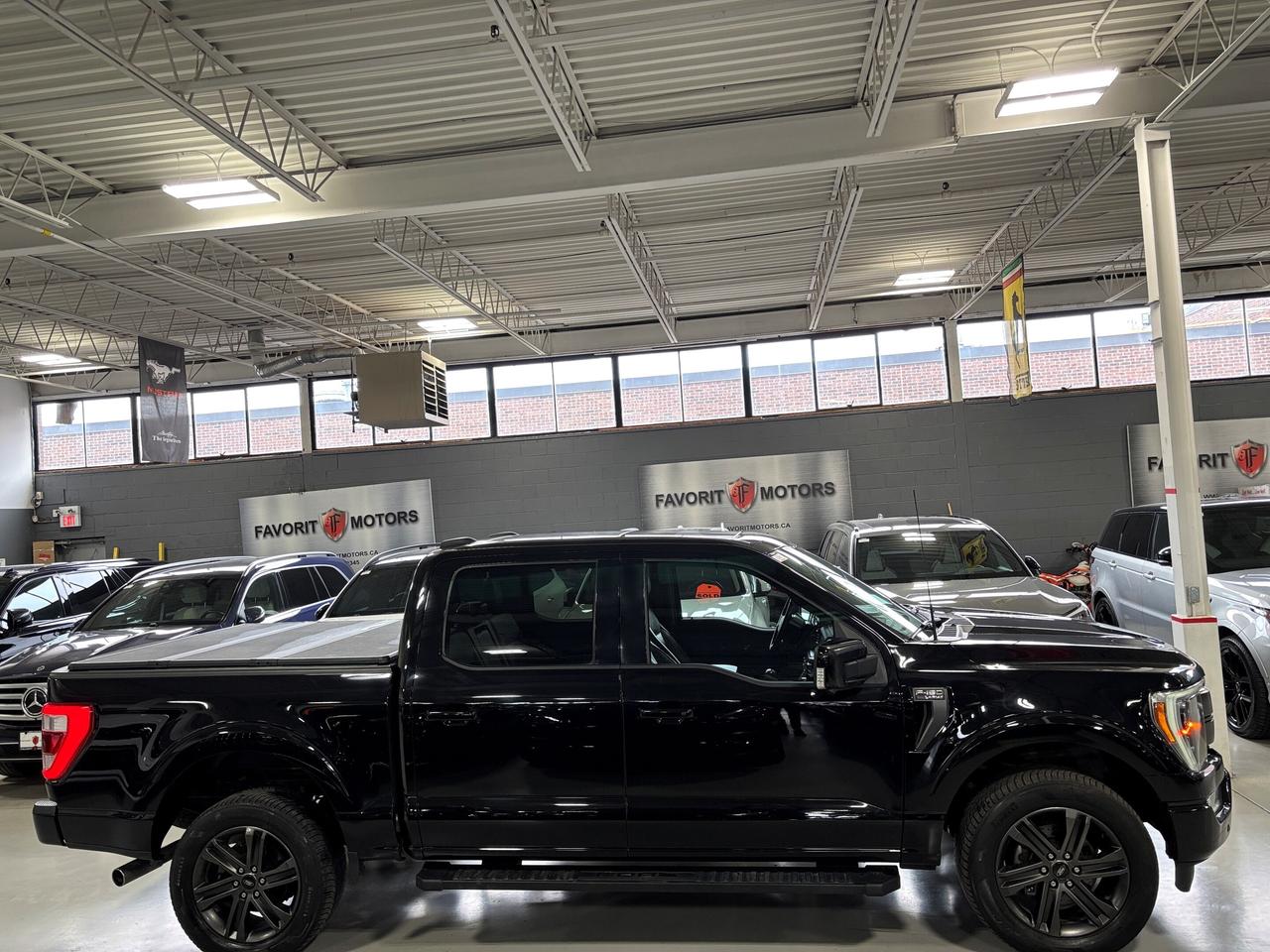 2022 Ford F-150 LARIAT|V8|4WD|SUPERCREW|NAV|BROWNLEATHER|PANOROOF| Photo