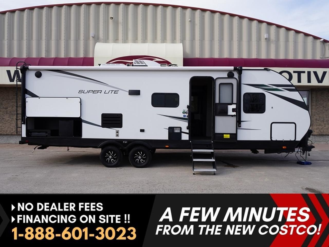 *** Dealer arranged financing on site! Quick, Simple, no calls or waiting on bank appointments required!! *** NO ADMINISTRATION FEES!!

Super Light!! Half ton towable! only 5,845 lbs dry weight !  Sleeps 9 to 10  people. 
2023 Starcraft Super Lite 261 BH , with TuffShell vacuum  bonded laminate fiberglass exterior.......Bunkhouse with large double rear bunks --  Private front Residential -- Queen Size bedroom --  Big slide out with tons of windows and natural light --  Spacious full kitchen with contemporary color and fixtures --  gorgeous wood grain waterproof vinyl plank flooring  -- 81 inch height interior  LED interior lighting -- roller blackout night shades -- Leather convertible dinette  -- leather convertible sofa  -- stainless steel appliances and  Entertainment center. 

This is a non-smoker camper, extremely well kept with high value features! ..and includes Thermal Seal- enclosed, insulated undercarriage. Tinted safety glass windows. This camper offers all of the requirements for a cross-country adventure ........... just in a super easy pull package!!


Features
- Double Rear Bunk Beds
- Private Front Queen Bedroom
- Slide-Out Living Area
- Power Awning with LED Lighting
- Smart TV
- JBL&reg; Premium indoor and outdoor multizone speakers
- Outdoor Kitchen
- Full Kitchen with Stove/Oven & Microwave
- Large Fridge & Freezer
- Dinette Seating (Convertible)
- Sofa Seating
- Full Bathroom with Shower and Bathtub
- Air Conditioning
- Furnace Heating
- Entertainment System
- Lightweight Towable Design
- Dual Axle Setup
- Electric Stabilizer Jacks
- LED interior lighting
- Medicine cabinet
- Fully-walkable roof
- Oversized pass-through storage with motion lighting
- Thermal Seal- enclosed, insulated and heated underbelly with fully insulated roof with a PVC roofing membrane
- Stainless steel single basin under-mount kitchen sink
- Tinted safety-glass windows throughout
- Powered 12V bathroom vent
- Range hood
- Residential high-rise faucet
- Roller blackout night shades
- Soft closing foot flush toilet

***EXTENDED WARRANTY options available to choose from to protect your RV and your wallet. (HUGE VALUE!!!) Zero down financing OAC with very Low monthly payments avail. Please see dealer for details. Trades accepted. View at Winnipeg West Automotive Group, 5195 Portage Ave. Dealer permit # 6007, Call now 1-(888) 601-3023.