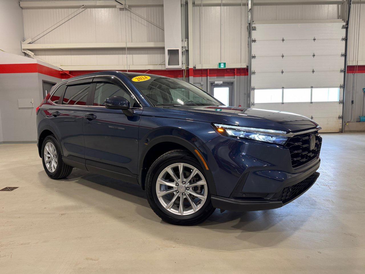 <span>For more than a quarter-century, the Honda CR-V has been a core member of Canadas growing SUV class. In fact, the CR-V is routinely one of Canadas best-selling SUVs, and its built in Canada, by Canadians, for Canadians. Its uniquely equipped for Canada, too. The 2024 CR-V is a sixth-generation Honda CR-V, and its better than ever, with&nbsp;<em>huge</em> interior space, amazing fuel efficiency, a truly premium cabin, and the continued benefits of Hondas RealTime AWD.&nbsp;</span>




<span>As a 2024 CR-V EX-L, this Honda benefits from all sorts of upmarket gear: leather seating, a huge 9-inch centre screen (with Apple CarPlay and wireless Android Auto), wireless charging, heated front and rear seats plus a heated steering wheel, a sunroof, and proximity access with pushbutton start. Theres also remote start, dual-zone automatic climate control, an 8-way power drivers seat with memory settings, a power front passenger seat. Dont forget the boatload of advanced tech: adaptive cruise control, blind spot monitoring, lane keeping assist, front and rear parking sensors, auto high beams, power tailgate, and so much more.</span>




<span>Of course, so much of the CR-Vs appeal is down to its versatility. There are 41 inches of rear seat legroom, 1,113 litres of cargo volume behind the rear seats, and 2,166 litres of max. cargo volume.</span>




<span style=font-weight: 400;>Thank you for your interest in this vehicle. Its located at Centennial Honda, 515 Central Street, Summerside, PEI. We look forward to hearing from you; call us toll-free at 1-902-436-9158.</span>