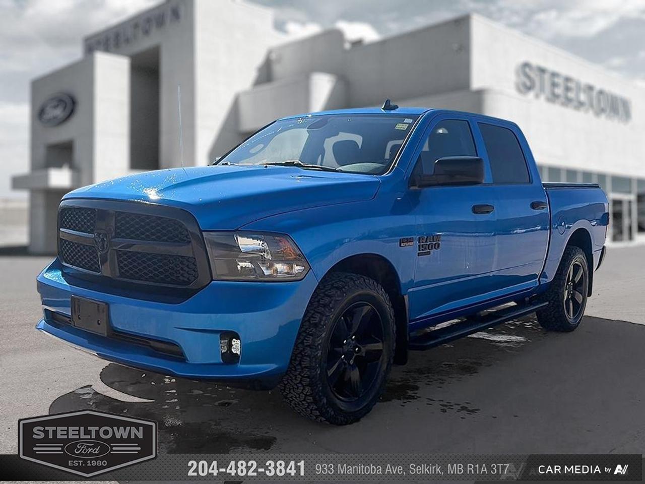 <b>Low Mileage, Aluminum Wheels,  Fog Lamps,  Rear Camera,  Cruise Control,  Air Conditioning!</b><br> <br> We value your TIME, we wont waste it or your gas is on us!   We offer extended test drives and if you cant make it out to us we will come straight to you!<br><br><br> <br>This Ram 1500 Classic is a top contender in the full-size pickup segment thanks to a winning combination of a strong powertrain, a smooth ride and a well-trimmed cabin. This 2021 Ram 1500 Classic is fresh on our lot in Selkirk. <br> <br>The reasons why this Ram 1500 Classic stands above its well-respected competition are evident: uncompromising capability, proven commitment to safety and security, and state-of-the-art technology. From its muscular exterior to the well-trimmed interior, this 2021 Ram 1500 Classic is more than just a workhorse. Get the job done in comfort and style while getting a great value with this amazing full size truck. This low mileage Crew Cab 4X4 pickup has just 48,000 km. Its Blue in colour. It has an Automatic transmission and is powered by a 395HP 5.7L 8 Cylinder Engine. It may have some remaining factory warranty, please check with dealer for details. <br> <br> Our 1500 Classics trim level is Express. Upgrading to this rugged 1500 Classic Express is a great choice as it comes loaded with stylish aluminum wheels, body colored bumpers, front fog lights, heavy-duty shock absorbers, electronic stability control and trailer sway control. Additional features include ParkView rear back-up camera, cruise control, air conditioning, an infotainment hub with SiriusXM, radio 3.0 and a USB port, automatic headlights, power windows, power doors, and more. This vehicle has been upgraded with the following features: Aluminum Wheels, Fog Lamps, Rear Camera, Cruise Control, Air Conditioning, Power Windows, Power Doors.<br> To view the original window sticker for this vehicle view this <a href=http://www.chrysler.com/hostd/windowsticker/getWindowStickerPdf.do?vin=3C6RR7KTXMG709783 target=_blank>http://www.chrysler.com/hostd/windowsticker/getWindowStickerPdf.do?vin=3C6RR7KTXMG709783</a>. <br/><br> <br>To apply right now for financing use this link: <a href=http://www.steeltownford.com/?https://CreditOnline.dealertrack.ca/Web/Default.aspx?Token=bf62ebad-31a4-49e3-93be-9b163c26b54c&La target=_blank>http://www.steeltownford.com/?https://CreditOnline.dealertrack.ca/Web/Default.aspx?Token=bf62ebad-31a4-49e3-93be-9b163c26b54c&La</a><br><br> <br/><br> Buy this vehicle now for the lowest bi-weekly payment of <b>$248.36</b> with $0 down for 96 months @ 8.99% APR O.A.C. ( Plus applicable taxes -  Platinum Shield Protection & Tire Warranty included   / Total cost of borrowing $14864   ).  See dealer for details. <br> <br>Family owned and operated in Selkirk for 35 Years.  <br>Steeltown Ford is located just 20 minutes North of the Perimeter Hwy, with an onsite banking center that offers free consultations. <br>Ask about our special dealer rates available through all major banks and credit unions.<br><br><br>Steeltown Ford Protect Plus includes:<br>- Life Time Tire Warranty <br>Cars cost less in Selkirk <br><br>Dealer Permit # 1039<br><br><br> Come by and check out our fleet of 110+ used cars and trucks and 160+ new cars and trucks for sale in Selkirk.  o~o