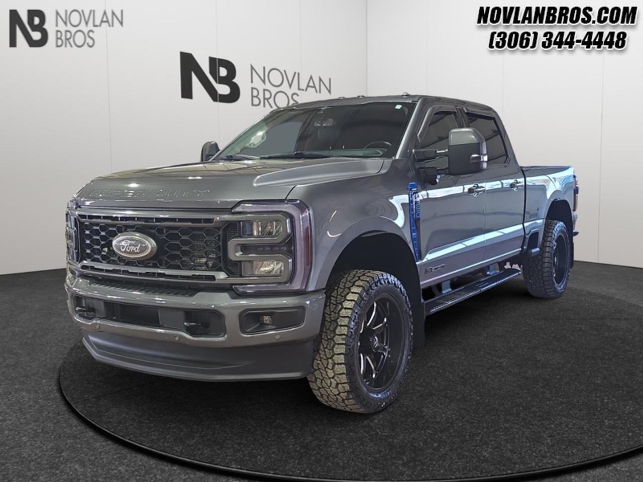 <b>Diesel Engine, Heated Seats, Sunroof, Navigation, Leather Interior!</b><br> <br> Check out our great inventory of pre-owned vehicles at Novlan Brothers!<br> <br>For hauling, towing, and getting the job done, look no further than this rugged F-350. This 2023 Ford F-350 Super Duty is for sale today in Paradise Hill.<br> <br>The most capable truck for work or play, this heavy-duty Ford F-350 never stops moving forward and gives you the power you need, the features you want, and the style you crave! With high-strength, military-grade aluminum construction, this F-350 Super Duty cuts the weight without sacrificing toughness. The interior design is first class, with simple to read text, easy to push buttons and plenty of outward visibility. This truck is strong, extremely comfortable and ready for anything.<br> <br>This sought after diesel Crew Cab 4X4 pickup has 151,725 km. Its Grey in colour. It has a 10 Speed Automatic transmission and is powered by a 475HP 6.7L 8 Cylinder Engine. <br> <br> Our F-350 Super Dutys trim level is Lariat. Experience rugged capability and luxury in this F-350 Lariat trim, which features leather-trimmed heated and ventilated front seats with power adjustment, memory function and lumbar support, a heated leather-wrapped steering wheel, voice-activated dual-zone automatic climate control, power-adjustable pedals, a sonorous 8-speaker Bang & Olufsen audio system, and two 120-volt AC power outlets. This truck is also ready to get busy, with equipment such as class V towing equipment with a hitch, trailer wiring harness, a brake controller and trailer sway control, beefy suspension with heavy duty shock absorbers, power extendable trailer style mirrors, and LED headlights with front fog lamps and automatic high beams. Connectivity is handled by a 12-inch infotainment screen powered by SYNC 4, bundled with Apple CarPlay, Android Auto, inbuilt navigation, and SiriusXM satellite radio. Safety features also include Ford Co-Pilot360 with a surround camera and pre-collision assist with automatic emergency braking and cross-traffic alert, blind spot detection, rear parking sensors, forward collision mitigation, and a cargo bed camera. This vehicle has been upgraded with the following features: Diesel Engine, Heated Seats, Sunroof, Navigation, Leather Interior, Alloy Wheels, Remote Engine Start.<br> To view the original window sticker for this vehicle view this <a href=http://www.windowsticker.forddirect.com/windowsticker.pdf?vin=1FT8W3BT2PEC63579 target=_blank>http://www.windowsticker.forddirect.com/windowsticker.pdf?vin=1FT8W3BT2PEC63579</a>. <br/><br> <br>To apply right now for financing use this link: <a href=http://novlanbros.com/credit/ target=_blank>http://novlanbros.com/credit/</a><br> <br/><br>The Novlan family is owned and operated by a third generation and committed to the values inherent from our humble beginnings.<br> Come by and check out our fleet of 20+ used cars and trucks and 80+ new cars and trucks for sale in Paradise Hill.  o~o