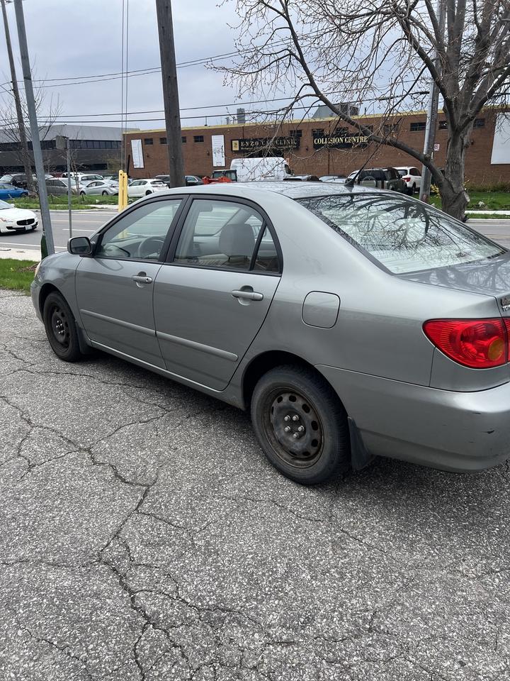 2003 Toyota Corolla 4dr Sdn CE Auto ac power locks power windows Photo