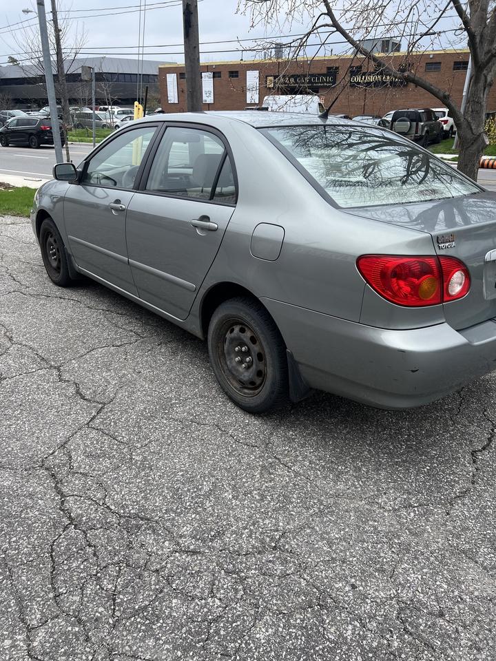 2003 Toyota Corolla 4dr Sdn CE Auto ac power locks power windows Photo