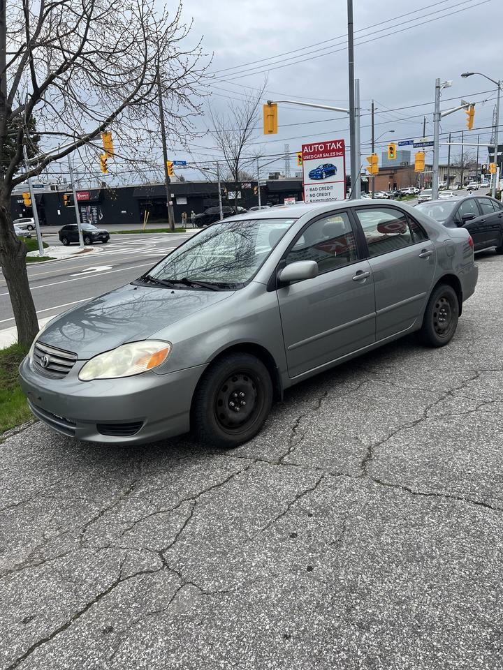 2003 Toyota Corolla 4dr Sdn CE Auto ac power locks power windows Photo
