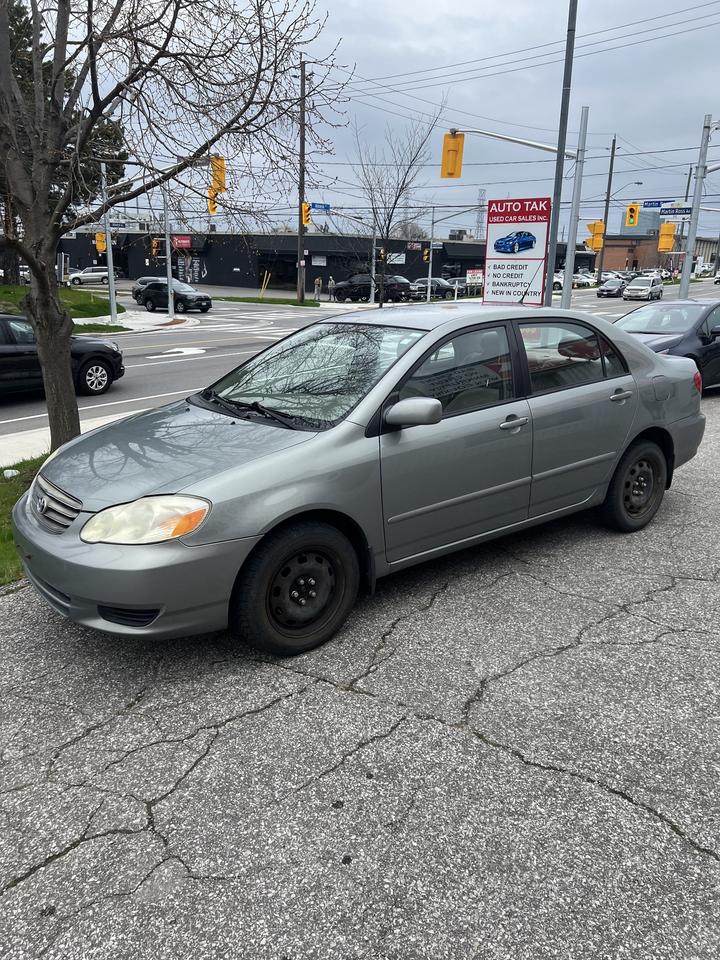 2003 Toyota Corolla 4dr Sdn CE Auto ac power locks power windows Photo
