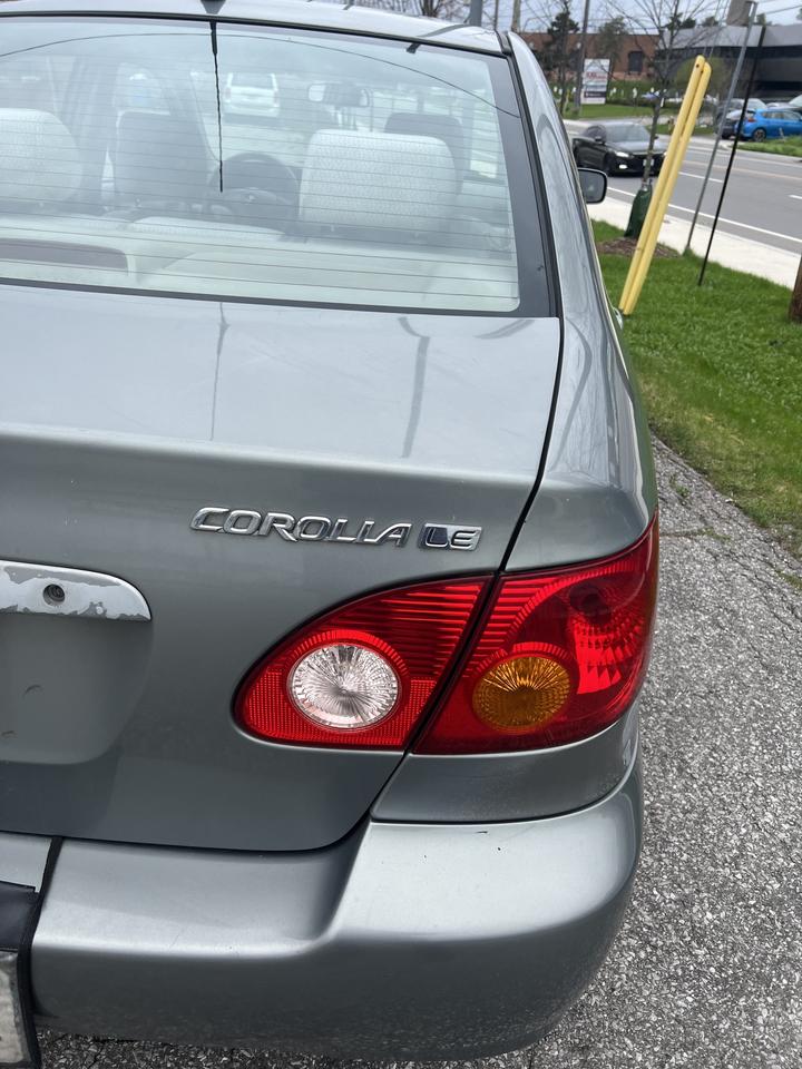 2003 Toyota Corolla 4dr Sdn CE Auto ac power locks power windows Photo