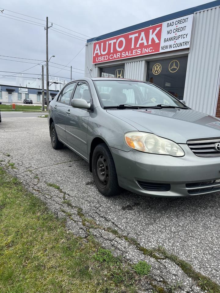 2003 Toyota Corolla 4dr Sdn CE Auto ac power locks power windows Photo