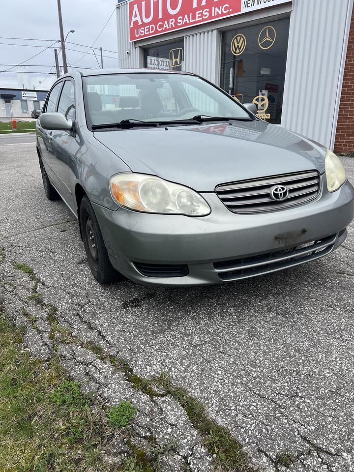 2003 Toyota Corolla 4dr Sdn CE Auto ac power locks power windows Photo