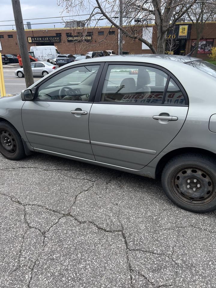2003 Toyota Corolla 4dr Sdn CE Auto ac power locks power windows Photo