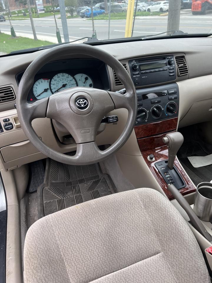 2003 Toyota Corolla 4dr Sdn CE Auto ac power locks power windows Photo
