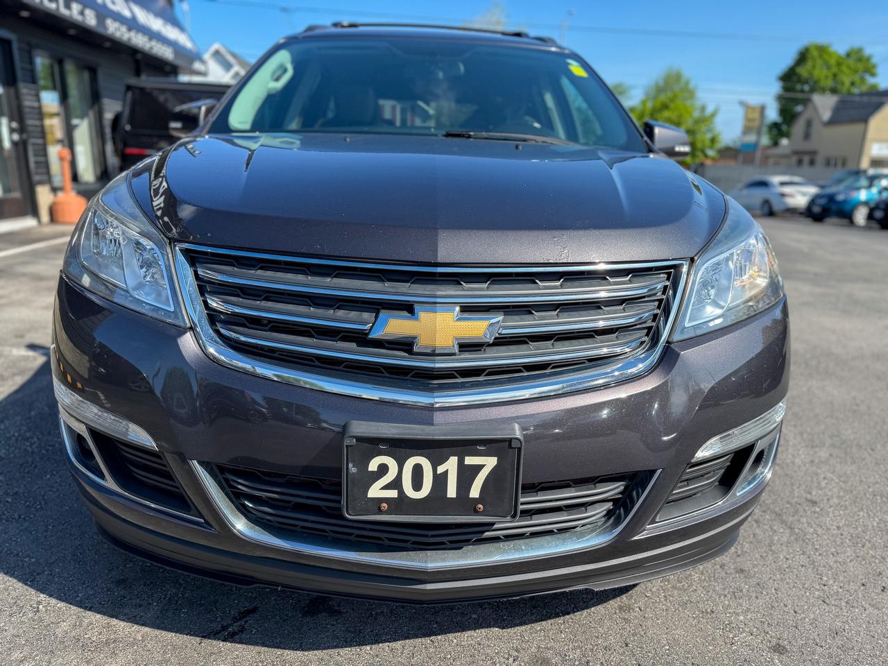 2017 Chevrolet Traverse 1LT/AWD/7 PASS/REMOTE/CAMERA/ROOF/CAPTAIN CHAIRS Photo