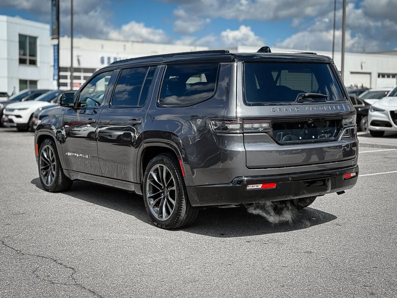 2024 Jeep Grand Wagoneer Series III   SERIES 3   OBSIDIAN   SEATBACK VIDEO Photo