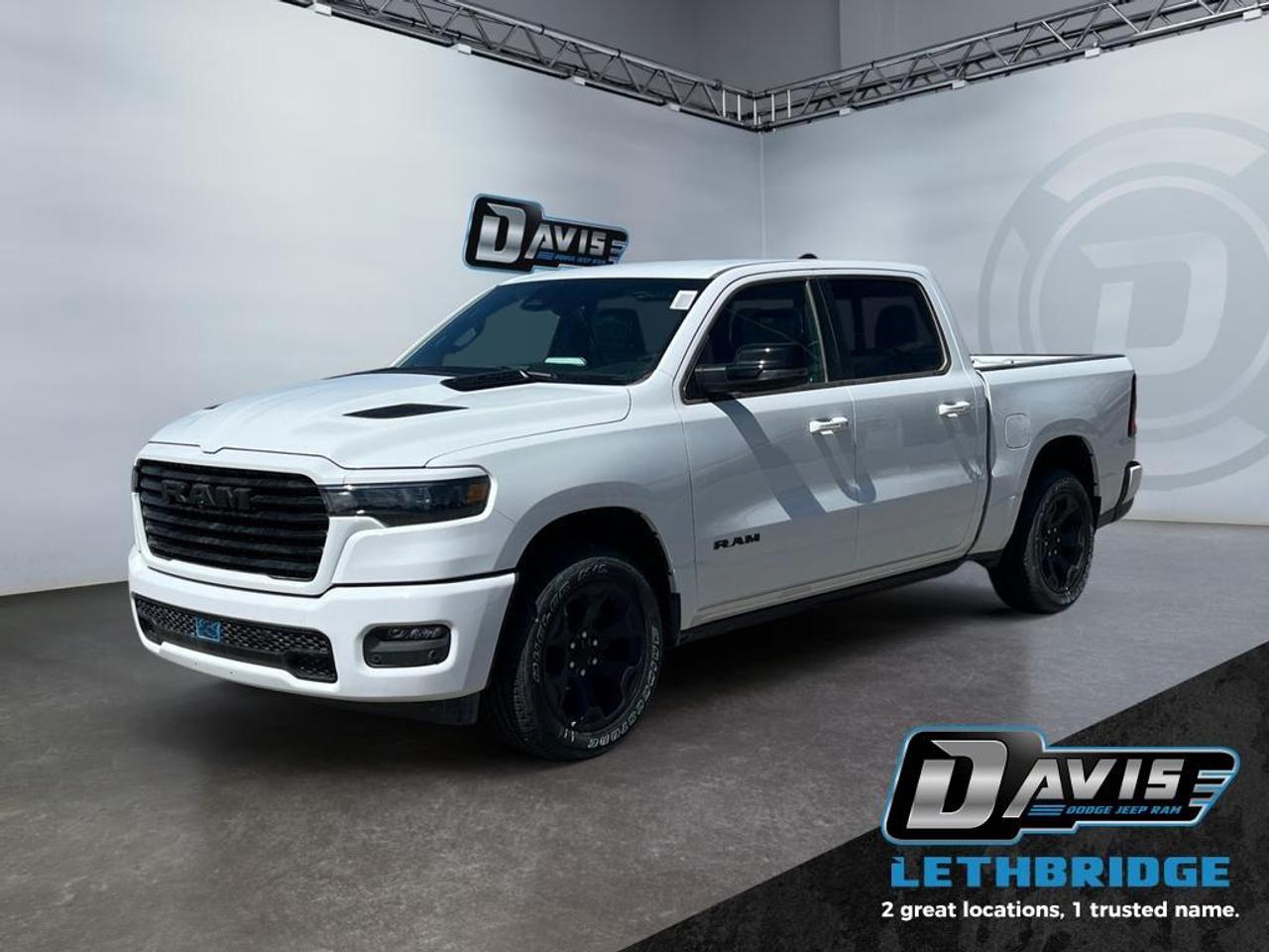 <b>Navigation, Apple CarPlay, Android Auto, 360 Camera, Heated Seats!</b><br /> <br /> <br /> <br />Experience the perfect balance of power and luxury in the 2026 Ram 1500, built to handle every job with style. <br /> <br />The Ram 1500's unmatched luxury transcends traditional pickups without compromising its capability. Loaded with best-in-class features, it's easy to see why the Ram 1500 is so popular. With the most towing and hauling capability in a Ram 1500, as well as improved efficiency and exceptional capability, this truck has the grit to take on any task.<br /> <br />This Bright White Crew Cab 4X4 pickup has an Automatic transmission and is powered by a 420HP 3.0L Straight 6 Cylinder Engine. <br /> <br /> Our 1500's trim level is Sport. This Ram 1500 in Sport trim rewards you with front heated seats, a leather-wrapped heated steering wheel, a 360 camera system, a 10-speaker Alpine audio, and a 12-inch infotainment screen with inbuilt navigation, Apple CarPlay and Android Auto, and 4G LTE Wi-Fi hotspot. Additional features include class IV towing equipment, aluminum wheels, power adjustable pedals, intersection collision assist, evasion assist, lane keep assist with lane departure warning, and even more! This vehicle has been upgraded with the following features: Navigation, Apple CarPlay, Android Auto, 360 Camera, Heated Seats, Heated Steering Wheel, Aluminum Wheels.<br /><br /> <br />To apply right now for financing use this link: <a href=https://lethbridge.davisdodge.ca/free-credit-check/ target=_blank rel=nofollow noopener noreferrer>https://lethbridge.davisdodge.ca/free-credit-check/</a><br /><br /> <br /><br />As a premier Chrysler, Dodge, Jeep and RAM dealership, Davis Dodge proudly offers an extensive selection of new and used vehicles to meet every drivers needs. Customers across Lethbridge, Fort Macleod, Taber, Claresholm, Coaldale, and beyond trust us for daily vehicle specials, certified service and parts, and a seamless online inventory experience. <br /><br /> With competitive financing options and expert support, we make car buying easy and enjoyable. <br /><br /> Ready to hit the road? Schedule your test drive today at Davis Dodge, your trusted Chrysler, Dodge, Jeep and RAM dealer in Lethbridge, Alberta.<br /><br /> Vehicle pricing offer shown expires 2026-04-30. <br /> Come by and check out our fleet of 60+ used cars and trucks and 100+ new cars and trucks for sale in Lethbridge. o~o