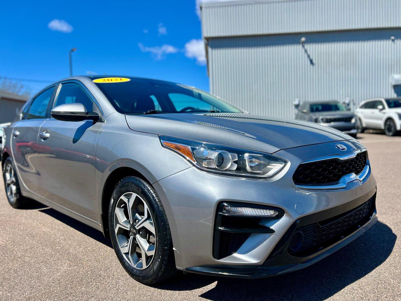<span>This 2021 Kia Forte EX isnt kidding around: its the real deal. The Fortes a decidedly upmarket small car, with everything from the technology to the material selections to the driving experience declaring that this is a whole lot of value packed into one car.&nbsp;</span>




<span>Theres exceptional fuel efficiency, as well: 5.9 L/100km on the highway. But long before you take a road trip showing just how little fuel the Forte uses, simply taking a seat inside the Forte is enough to really impress. Standard equipment on the 2021 Kia Forte EX includes wireless phone charging, an 8-inch centre screen with Apple CarPlay/Android Auto and a rearview camera, blind spot monitoring and rear cross traffic alert, heated front seats and a heated steering wheel, lane keeping assist, forward collision avoidance assist, and driver attention alert system.&nbsp;</span>




<span style=font-weight: 400;>Thank you for your interest in this vehicle. Its located at Centennial Kia of Summerside, 670 Water Street, Summerside, PEI. We look forward to hearing from you; call us at&nbsp;1-902-724-4542.</span>