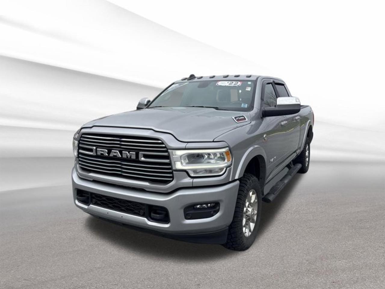 This used 2022 RAM 2500 Laramie is built for hard work and long hauls. It comes finished in Silver with a Black interior, four doors, four-wheel drive, and an automatic transmission. Power comes from the proven 6.7-litre intercooled turbo diesel inline-six engine, giving this heavy-duty truck the strength buyers expect in Halifax.With 121,015 km on the odometer, this 2022 RAM 2500 Laramie still delivers the capability and confidence that make a heavy-duty pickup such a smart choice. Air Suspension adds extra comfort and load support, while rain-sensing windshield wipers and Apple CarPlay bring everyday ease to every trip around town or out to the jobsite.FEATURES OF THE 2500 LaramiePremium cabin design with upscale detailsHeavy-duty diesel power for serious workFour-wheel drive for added tractionAutomatic transmission for smooth operationTRUCK FEATURESStrong diesel engine for heavy towingFour-wheel drive helps on rough terrainAir Suspension supports comfort and controlFour-door cab adds daily practicalityADVANCED SAFETY FEATURESRain-sensing wipers help in poor weatherFour-wheel drive adds slippery-road confidenceHeavy-duty build inspires solid road feelLarge truck design supports strong visibilityPERFORMANCE AND EFFICIENCY6.7-litre turbo diesel delivers strong torqueAutomatic transmission supports smooth power deliveryFour-wheel drive boosts all-surface tractionDiesel power suits towing and haulingCOMFORT AND CONVENIENCEAir Suspension improves ride comfortFour full doors ease passenger accessBlack interior offers a clean lookSpacious cabin suits work and travelTECHNONOLGY AND CONNECTIVITYApple CarPlay supports familiar smartphone accessEasy connection for calls and mediaClear interface helps daily usabilityModern tech adds driving convenienceCARGO SPACEPickup bed handles large work itemsCabin offers room for personal gearFour-door layout adds storage flexibilityHeavy-duty design suits demanding cargoAWARDS & RECOGNITIONSBest Residual Value, Canadian Black Book, 2022WHAT OTHER OWNERS LIKEStrong diesel torque for towing confidenceComfortable ride for a heavy-duty truckUseful cabin space for daily needsFour-wheel drive for winter assuranceThis 2022 RAM 2500 Laramie is a practical heavy-duty truck for drivers who need real capability without giving up comfort. Its diesel engine, automatic transmission, four-wheel drive system, and Air Suspension make it ready for towing, hauling, and year-round driving in Nova Scotia.At Steele Halifax Chrysler Dodge Jeep Ram FIAT in Halifax, this used 2022 RAM 2500 Laramie stands out for its honest equipment list and proven heavy-duty design. If you want a truck with diesel strength, useful technology, and the comfort to handle long days, this one deserves a close look.This 2022 RAM 2500 Laramies VIN is: 3C6UR5FL2NG251120.We invite you to book a viewing and test drive at your earliest convenience