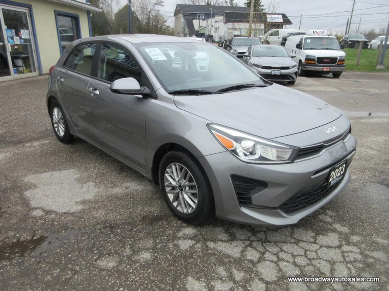 2023 Kia Rio5 WELL EQUIPPED S-TYPE 5 PASSENGER 1.6L - DOHC.. HEATED SEATS & WHEEL.. POWER SUNROOF.. BACK-UP CAMERA.. BLUETOOTH SYSTEM.. KEYLESS ENTRY.. Photo