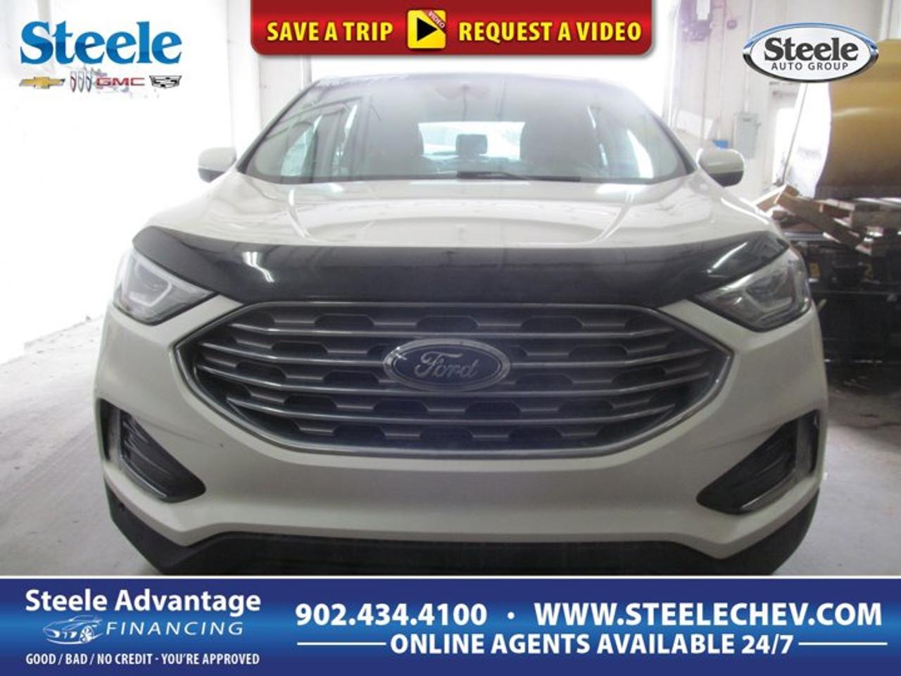 Built for Canadian driving and loaded with the upscale feel buyers expect, this 2019 Ford Edge Titanium delivers a smart mix of comfort, confidence, and turbocharged efficiency. Offered by Steele Chevrolet Buick GMC in Dartmouth, this used SUV has 166,541 km and pairs a smooth automatic transmission with all-wheel drive for composed travel in changing road conditions.The 2019 Ford Edge Titanium stands out with its refined road manners, quiet cabin, and practical everyday versatility. Its 2.0-litre intercooled turbocharged four-cylinder gas engine gives you responsive power for highway merging and city driving alike. Paddle shifters add a more engaging feel when you want quick manual control through the automatic transmission.FEATURES OF THE Edge TitaniumTurbocharged 2.0-litre four-cylinder gas engineAutomatic transmission with paddle shiftersAll-wheel drive for added tractionFour-door SUV practicality and comfortADVANCED SAFETY FEATURESAll-wheel drive supports confident road gripFour-wheel disc braking for controlled stopsTraction management helps on slick roadsSolid SUV design inspires daily confidencePERFORMANCE AND EFFICIENCYTurbo engine delivers responsive passing powerAutomatic transmission shifts smoothly and quicklyPaddle shifters add hands-on controlBalanced ride for highway comfortCOMFORT AND CONVENIENCEFour-door layout improves daily accessSpacious cabin suits family travelComfortable ride for longer commutesEasy entry height for passengersTECHNOLOGY AND CONNECTIVITYPaddle shifters enhance driver interactionClear driving layout supports easy useAutomatic transmission simplifies daily operationModern cabin design feels user-friendlyCARGO SPACESUV body offers versatile hauling roomRear cargo area suits errandsFlexible space for travel gearPractical shape helps load larger itemsAWARDS & RECOGNITIONSTop Safety Pick, Insurance Institute for Highway Safety, 2019WHAT OTHER OWNERS LIKESmooth ride on city roadsConfident all-wheel drive in winterStrong turbo power for passingUseful cargo room for daily lifeThis 2019 Ford Edge Titanium is a great fit for drivers who want a midsize SUV that feels polished on the road without giving up practicality. The Titanium trim is well known for offering a more premium driving experience, and this Edge keeps that reputation with composed handling, a quiet highway character, and the added confidence of all-wheel drive.Its turbocharged 2.0-litre engine is a smart match for this SUV. It gives solid low-end response for everyday traffic and steady power when climbing speed on the highway. The automatic transmission helps keep the drive smooth, while the paddle shifters let you take a more active role when road conditions or personal preference call for it.For families, commuters, and weekend travellers, the cabin layout makes good sense. Four full doors improve access for passengers, and the SUV design gives you the flexibility needed for groceries, sports bags, luggage, and daily gear. The ride height also makes entry and exit easier than in many lower vehicles.This used 2019 Ford Edge Titanium also benefits from a design that remains modern and appealing. It has the road presence buyers want in a midsize SUV, yet it stays manageable in urban settings and parking lots. In Dartmouth, where weather and road conditions can change quickly, the all-wheel-drive system is a valuable feature that supports year-round confidence.If you are looking for a well-rounded used SUV with turbo efficiency, practical space, and a more refined personality, this 2019 Ford Edge Titanium deserves a close look at Steele Chevrolet Buick GMC.This 2019 Ford Edge Titaniums VIN is: 2FMPK4K9XKBC65923 .