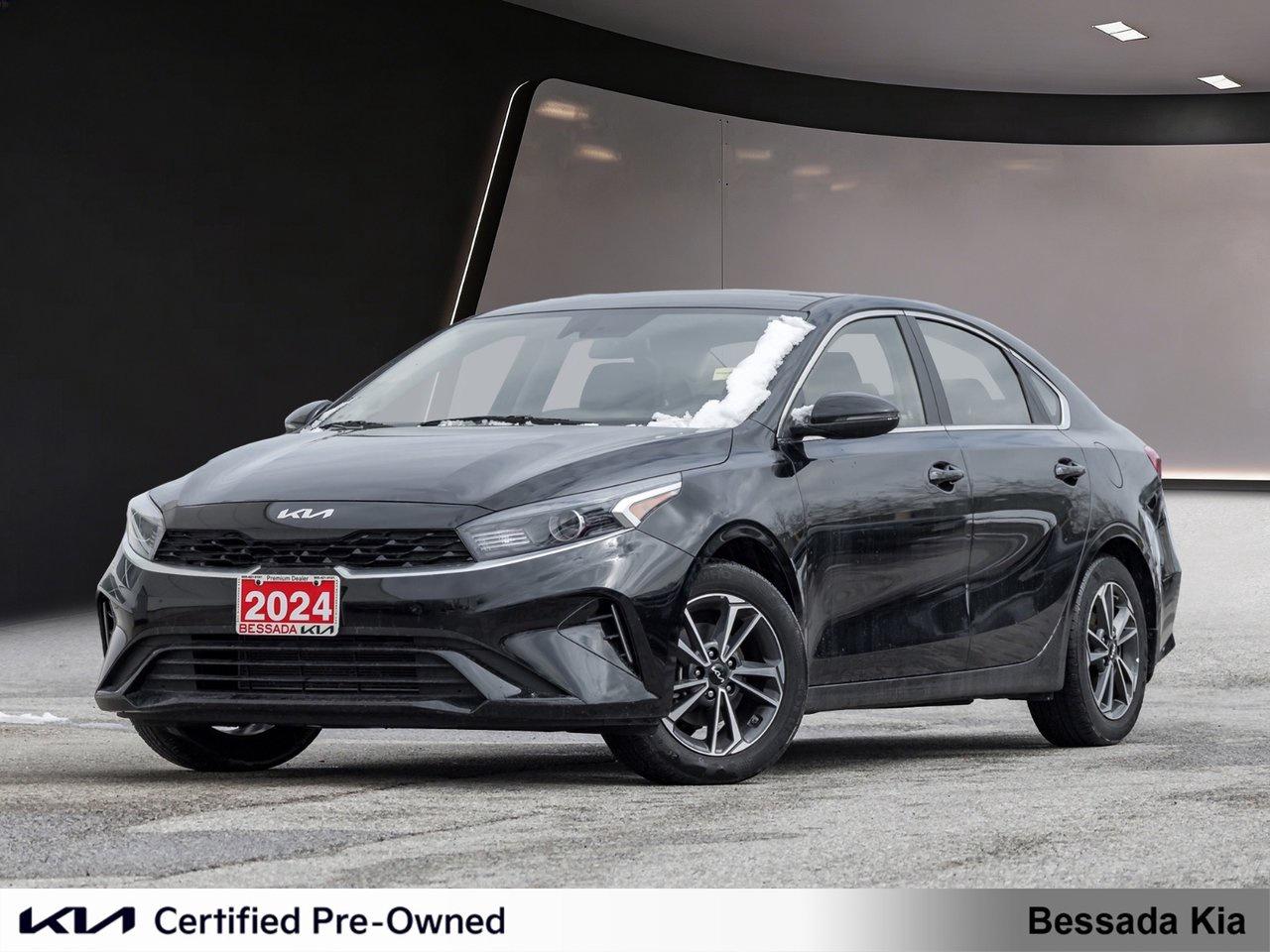 The 2024 Kia Forte EX offers a sleek design, excellent fuel efficiency, and a comfortable interior. It features heated seats, a touchscreen dispaly with Apple Carplay and Android Auto, alloy wheels, and advanced safety features for a smooth and confident everyday drive.