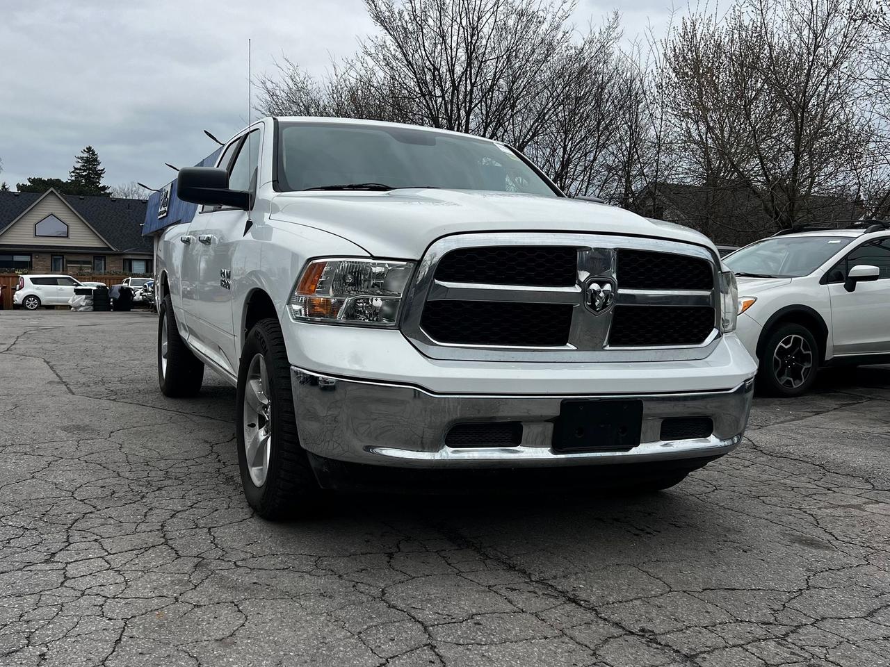 Used 2014 RAM 1500 4WD Quad Cab 140.5