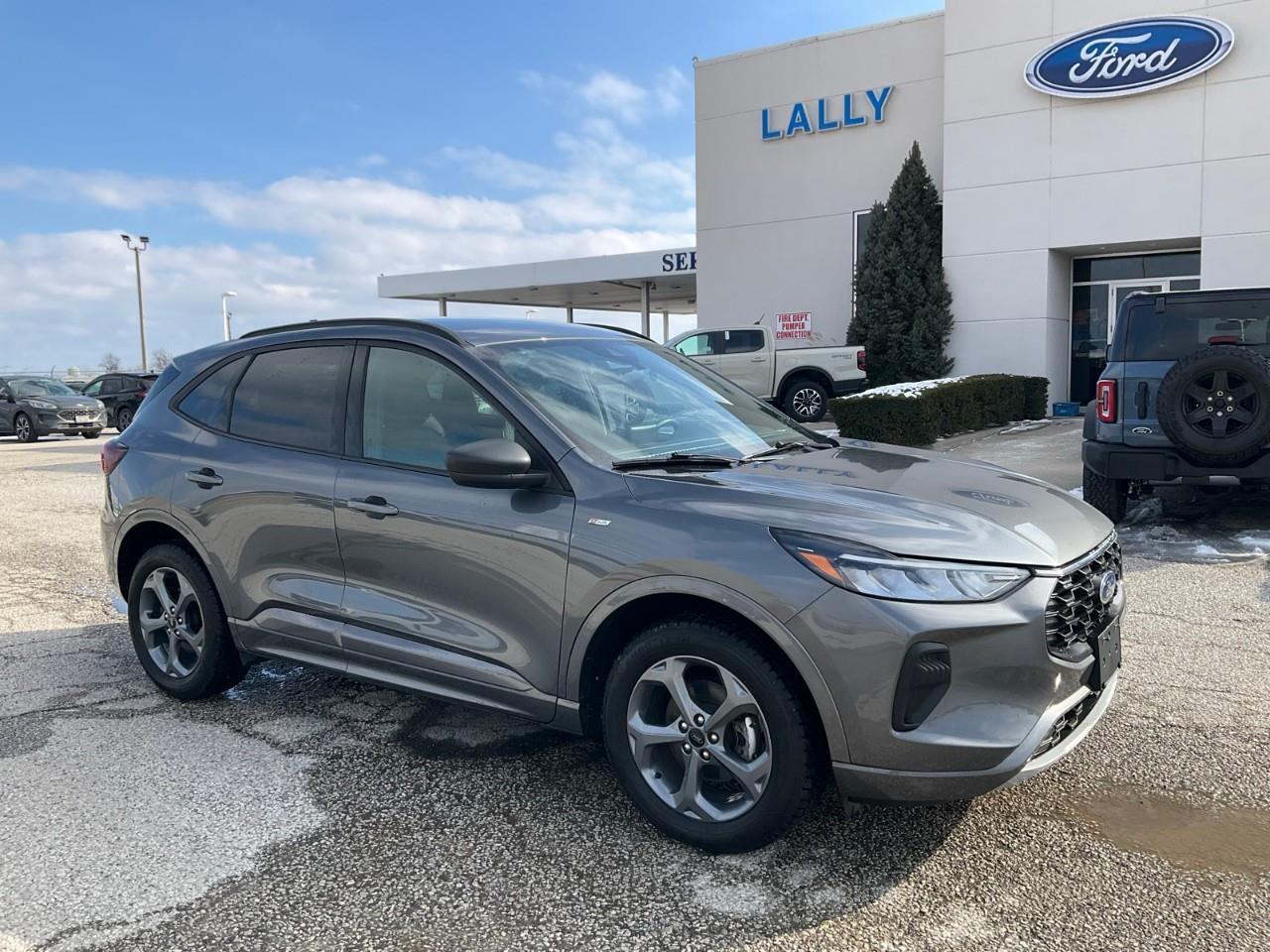 <p>This 2023 Ford Escape ST Line Hybrid AWD is in excellent condition, it is accident free and comes with a free vehicle history report.</p><p>Heated seats, heated steering, remote start, cruise control, lane keeping system, blind spot monitoring, reverse camera, Bluetooth, Sirius XM ready and much more. All Pre-Owned vehicles come standard with one key. If we received additional keys from the previous owner they will be with the vehicle upon delivery at no cost. Additional keys may be purchased at customers requested and expense.</p><p>We use no haggle, no hassle live market pricing to make sure you are getting the best deal possible. Save time and money and book your test drive today!</p><p>Our finance department deals with all of the major banks and lenders and we will do everything we can to get you approved and secure the lowest interest rate possible.</p><p>Powertrain warranty remains until 100,000kms, extended warranty options are available.</p><p><strong> Special Sale price listed is available to finance purchases only on approved credit. Price of vehicle may differ with other forms of payment.</strong></p>