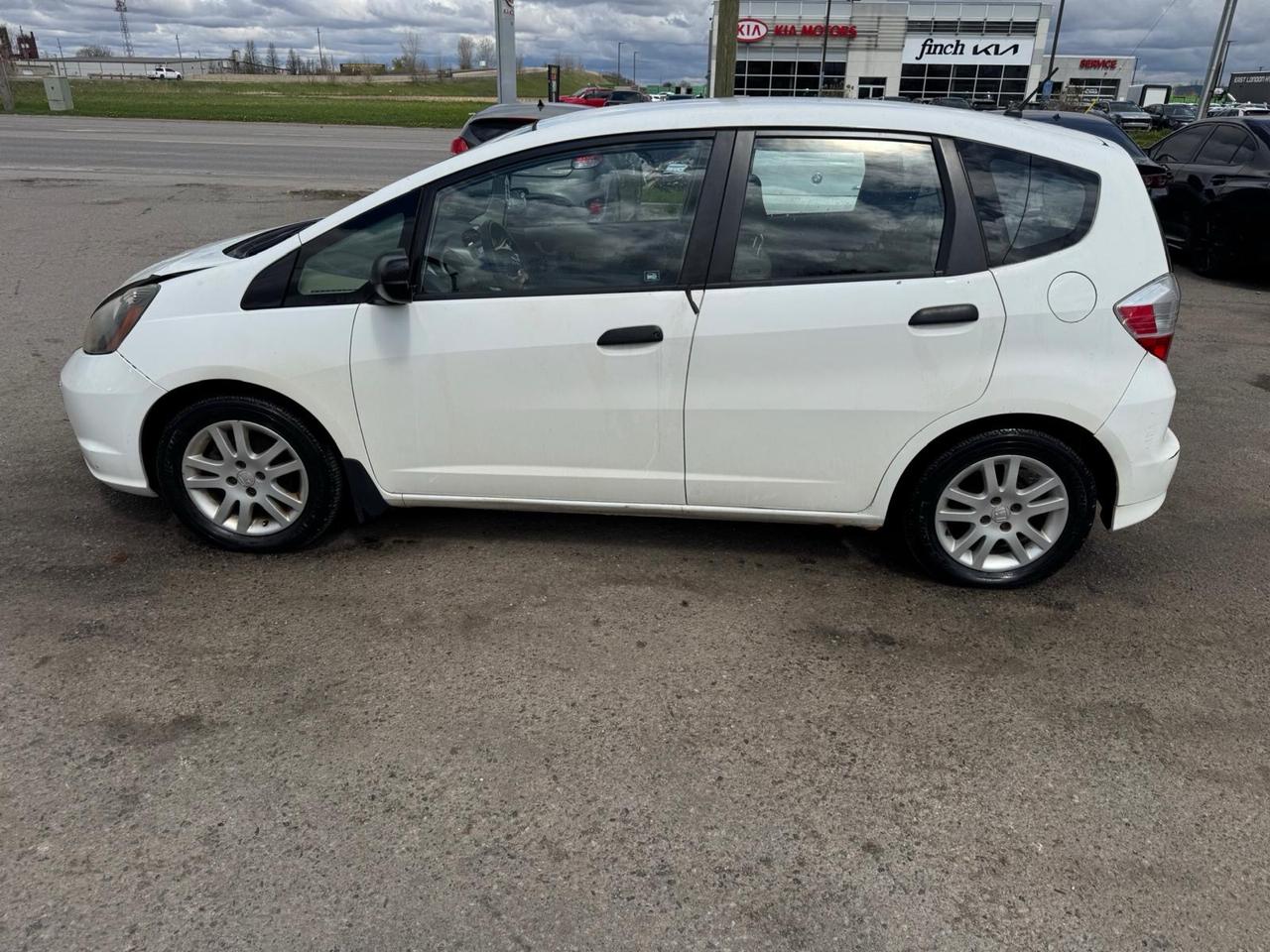 2013 Honda Fit DX-A, HATCH, RUNS WELL, NEEDS BODYWORK, AS IS Photo