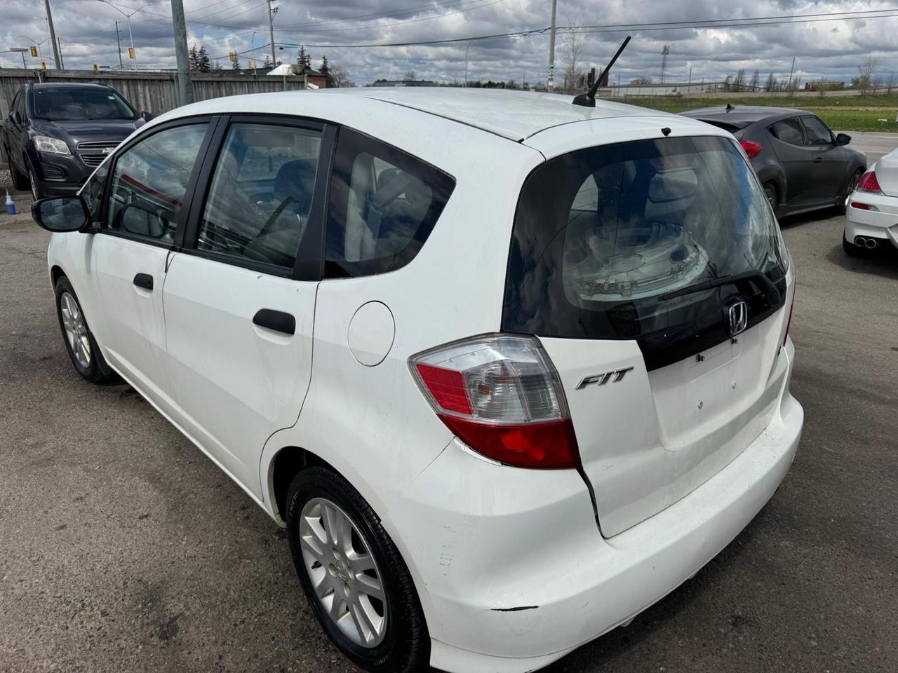 2013 Honda Fit DX-A, HATCH, RUNS WELL, NEEDS BODYWORK, AS IS Photo