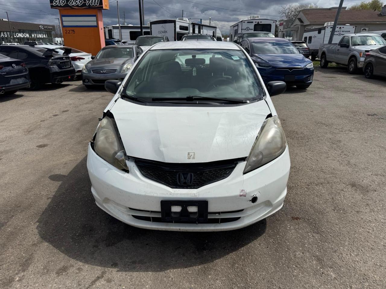 2013 Honda Fit DX-A, HATCH, RUNS WELL, NEEDS BODYWORK, AS IS Photo
