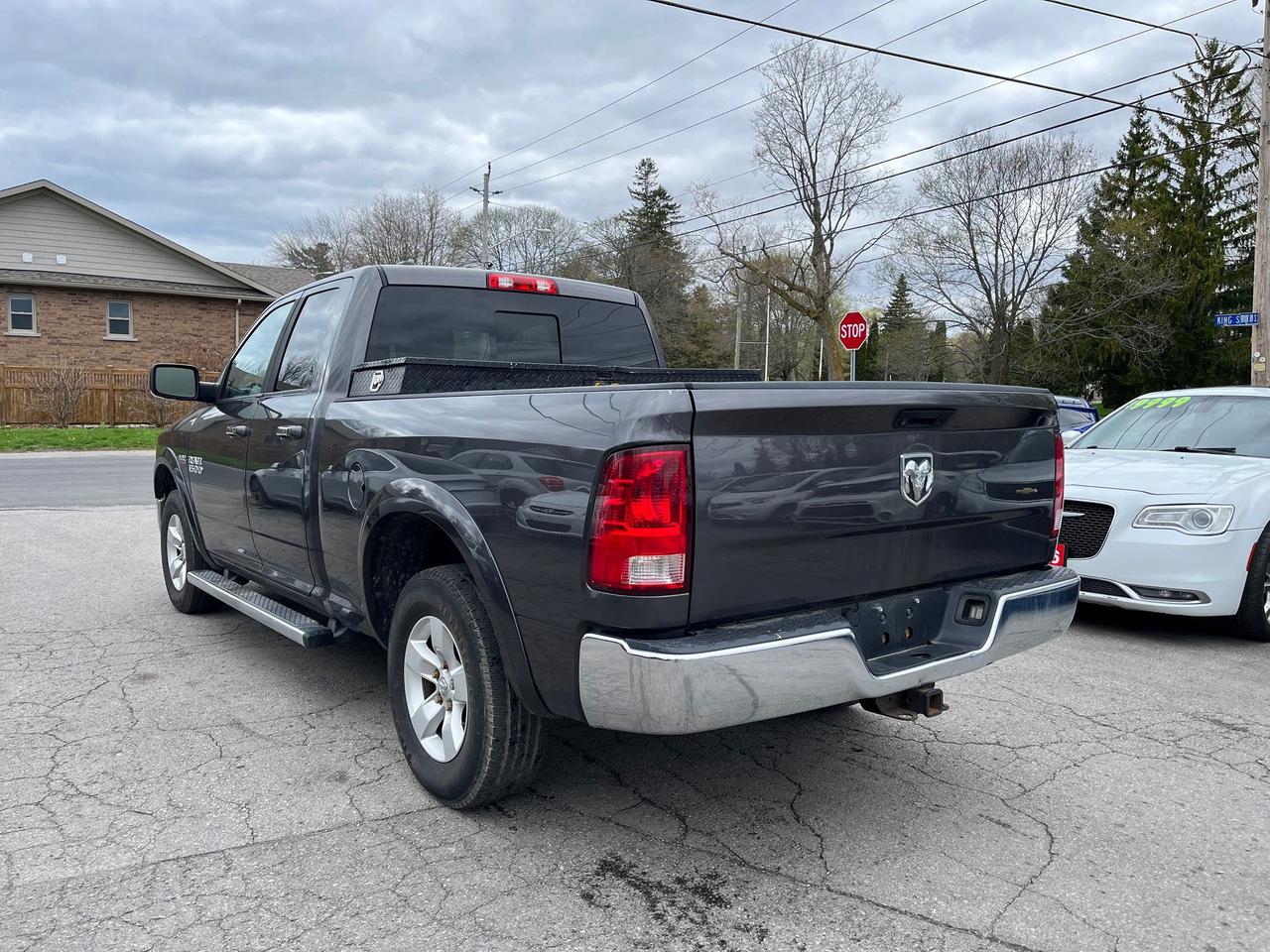 2014 RAM 1500 4WD Quad Cab 140.5" Outdoorsman Photo4