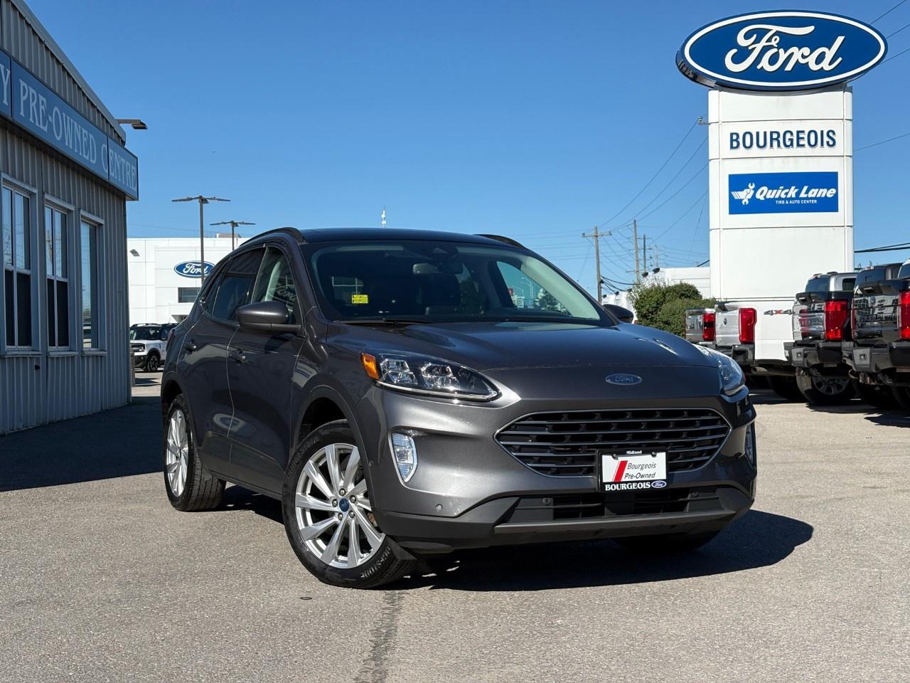 <p>Experience the 2021 Ford Escape Titanium AWD in an eye-catching gray color with unmatched all-wheel drive performance. This SUV ensures a confident and commanding drive, with handling that adapts to all road conditions.</p><p>The Ford Escape's exterior is adorned with sleek alloy wheels and is accentuated by functional features like heated mirrors, ensuring your visibility in any weather. Inside, the luxurious black interior offers comfort with heated seats and a heated steering wheel, providing a cozy retreat even on the chilliest days.</p><p>For the tech-savvy, this Escape is loaded with a suite of advanced technology. The intelligent navigation system paired with a remarkable backup camera and parking sensors takes the guesswork out of maneuvering in tight spots. Plus, stay connected with a built-in Wi-Fi hotspot and smart device integration, letting you command your journey with ease. Top-tier safety features include adaptive cruise control and lane assist, offering peace of mind for both driver and passengers.</p><p>The 2021 Ford Escape Titanium AWD is perfect for those who refuse to compromise on style, technology, or safety. If you're looking for a vehicle that seamlessly combines these elements, this is the SUV for you. Contact us today to learn more and take this exceptional vehicle for a test drive. We look forward to assisting you in making the Escape your own.</p> <p><strong>Why Choose the Bourgeois Auto Group?</strong></p><p>For 80 years, Bourgeois Auto Group has been delivering exceptional automotive experiences. Our factor trained teams work to ensure you receive the shopping experience you deserve; whether you're looking for a new or new-to-you vehicle.</p><p>Shop 24/7 with our online showroom and chat service, ensuring convenience every step of the way. No hidden fees, full disclosure, and every pre-owned vehicle comes with a Carfax® report for peace of mind.</p><p>We offer a wide selection of pre-owned vehicles, all competitively priced using real-time market data. Get the best deal on your purchase and trade-in with our free Live Market Analysis report.</p><p>Looking to sell your car? We buy any make or modelno purchase required. Our simple to use online trade valuation tool will provide you with a clear, transparent selling experience whether you buy our car or not.</p><p>Backed by hundreds dedicated employees across 4 convenient locations, were here to meet all your automotive needs. Visit us in Midland or Parry Sound and explore our inventory or schedule your next service today.</p> <p><strong>Financing Your Next Vehicle with Bourgeois Motors Ford in Midland:</strong></p><p>At Bourgeois Motors Ford, we make financing your next vehicle simple and stress-free! Our team works with trusted lenders to find flexible options tailored to your budget. Drive away with confidenceapply today!</p><p>Take advantage of our online pre-qualification tool, backed by Equifax and TD Bank to find the payment that works for you. Simply <a href=https://www.bourgeoismotors.com/free-credit-check/ rel=nofollow><strong>CLICK HERE</strong></a><strong> </strong>to use our secure online credit tool with no impact to your credit.</p>