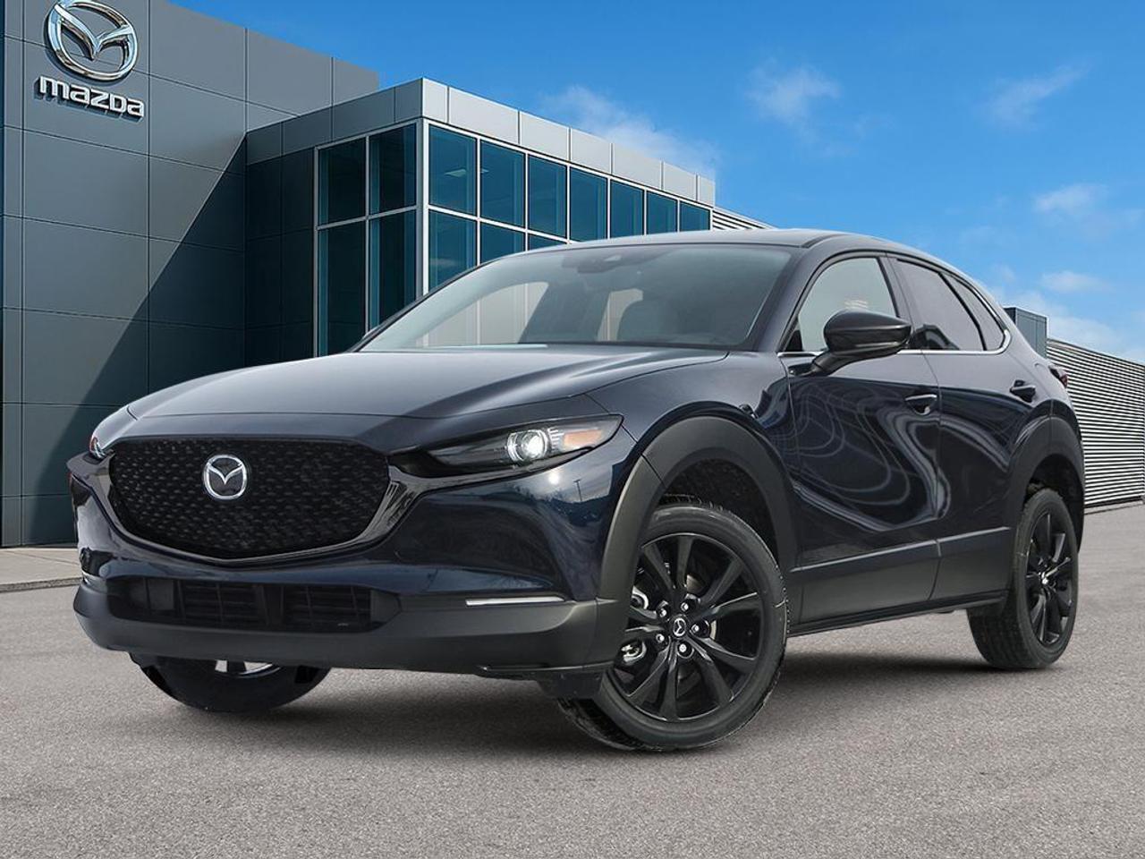 <p>Introducing the stunning 2026 Mazda CX-30 GT w/Turbo AWD at Cobourg Mazda, dressed in a captivating Deep Crystal Blue Mica. This all-wheel-drive SUV not only offers a dynamic driving experience but also ensures superb handling in various conditions.</p><p>The Mazda CX-30's sleek exterior features alloy wheels and a beautiful panoramic sunroof, while the sophisticated interior is adorned with premium black leather upholstery, elevating both comfort and style. Standard heated mirrors and a heated steering wheel add to the luxurious touches, ensuring every drive is as pleasant as it is comfortable.</p><p>Technologically advanced, this model boasts a host of features including a heads-up display, navigation system, and smart device integration to keep you connected. Safety is paramount with lane assist, adaptive cruise control, brake assist, and parking sensors, providing peace of mind on every journey.</p><p>Ideal for tech-savvy adventurers and stylish commuters alike, the Mazda CX-30 GT w/Turbo AWD combines elegance with practical features designed for modern living. Visit us at Cobourg Mazda to discover more about the exclusive offers including a 2.99% lease APR. Don't miss out on Owner Loyalty rewards and $500 Event Funds available for a limited time only. Contact us today to learn more!</p>