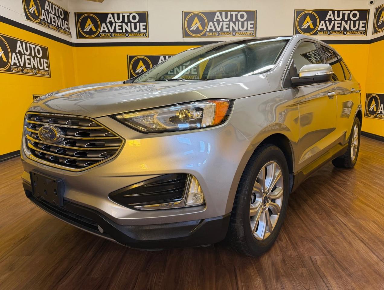 This exceptional example of a 2020 Ford Edge Titanium is proudly offered by Auto Avenue Airdrie. <br/> Versatile, refined, and built to elevate every drive, this SUV delivers the perfect balance of performance, comfort, and modern design. The Ford Edge Titanium stands out with its bold styling and smooth handling, making it an excellent choice for both daily commuting and weekend adventures. Inside, you&rsquo;ll find a thoughtfully designed cabin that offers premium materials and advanced technology for a truly enjoyable driving experience. <br/> Equipped with all-wheel drive, this Edge provides confidence and stability in a variety of road and weather conditions. Premium features such as a panoramic sunroof, leather seating, and integrated navigation system enhance every journey, offering both convenience and sophistication behind the wheel. <br/> Crafted for drivers who expect more from their vehicle, this Ford Edge Titanium delivers outstanding quality, comfort, and capability. This is more than just an SUV - it&rsquo;s the perfect combination of luxury and practicality.<br /><br />AUTO AVENUE IS AN AMVIC LICENSED DEALERSHIP, COMMITTED TO PROVIDING EXCEPTIONAL SERVICE AND QUALITY VEHICLES WITH FLEXIBLE PAYMENT OPTIONS. <br/>