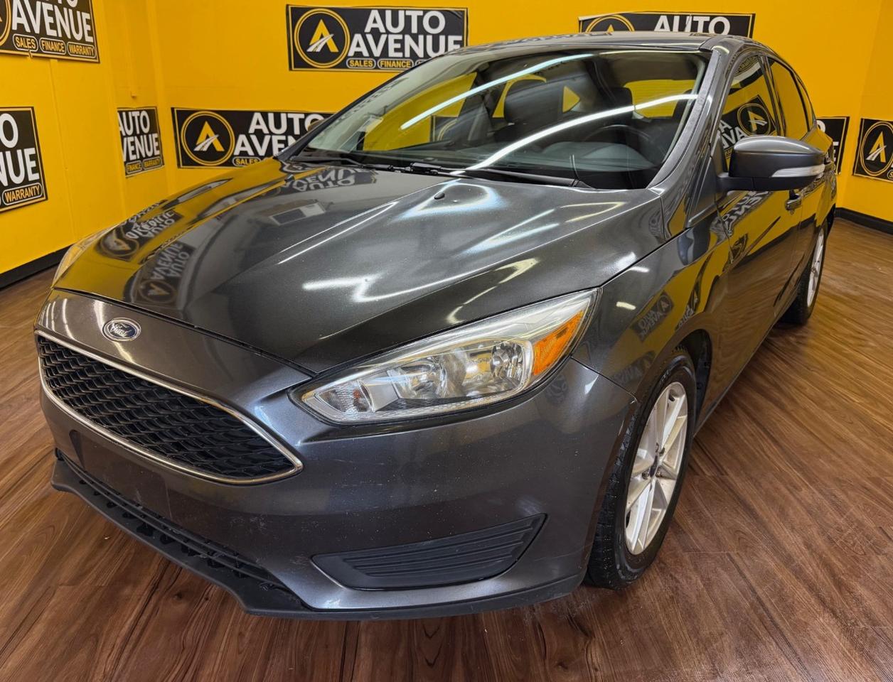 This impressive example of a 2015 Ford Focus SE is proudly offered by Auto Avenue. <br/> Sporty, efficient, and fun to drive, this Ford Focus delivers the perfect combination of style and everyday practicality. Its sleek exterior design is complemented by a well-crafted interior, offering comfort and intuitive features that make every drive enjoyable&mdash;whether youre commuting or heading out on the open road. <br/> Equipped with a backup camera and heated seats, this Focus SE adds both convenience and comfort to your driving experience. Responsive handling and solid performance ensure a confident ride, while its smart design makes it an excellent choice for drivers who value both efficiency and reliability. <br/> With its eye-catching design and proven dependability, this Ford Focus SE stands out from the crowd. This is more than just a car - it&rsquo;s the perfect blend of performance, comfort, and value.<br /><br />AUTO AVENUE IS AN AMVIC LICENSED DEALERSHIP, COMMITTED TO PROVIDING EXCEPTIONAL SERVICE AND QUALITY VEHICLES WITH FLEXIBLE PAYMENT OPTIONS. <br/>