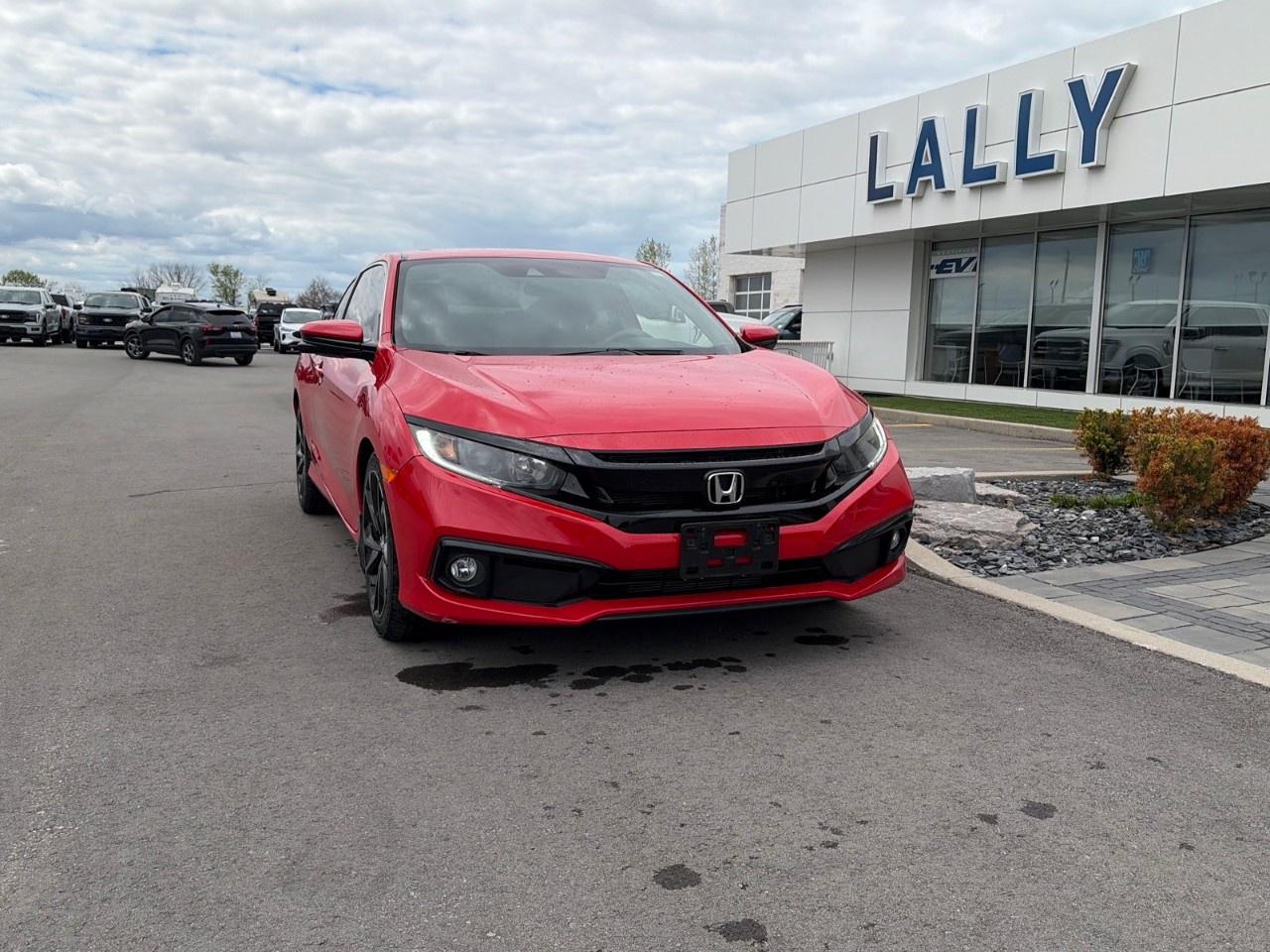<p>The 2019 Honda Civic Sport with a 4-cylinder automatic (CVT) is a compact sedan that blends everyday efficiency with a slightly sportier look and feel. It typically comes with a 2.0-litre inline-4 engine producing about 158 horsepower, paired with a continuously variable automatic transmission and front-wheel drive, delivering around 2932 mpg combined fuel economy. Inside, it offers seating for five, modern tech like a touchscreen with smartphone integration, and features such as paddle shifters and a leather-wrapped steering wheel, while the exterior adds sporty touches like larger wheels and subtle styling upgrades. Overall, its known as a reliable, fuel-efficient daily driver with a balance of comfort and mild performance.</p>