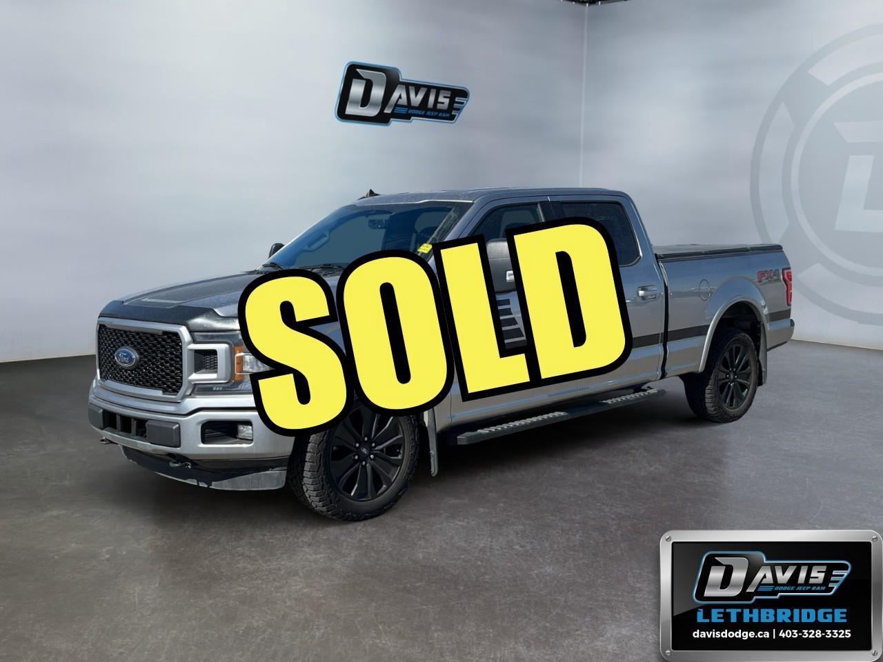 <b>Apple CarPlay, Android Auto, Tonneau Cover, Boxliner<br /></b><br /> Experience rugged capability and modern comfort with this 2020 Ford F-150 XLT Sport SuperCrew 4x4 powered by a proven 5.0L V8 engine and smooth 10-speed automatic transmission. Finished in Iconic Silver with the XLT Sport Package, this F-150 delivers bold styling, impressive towing capability, and a spacious SuperCrew cab perfect for work or family life.<br /><br />Loaded with sought-after features including 4x4, FX4 Off-Road Package, XLT Special Edition Package, SYNC 3, Apple CarPlay & Android Auto compatibility, rear-view camera, remote keyless entry, trailer tow package, electronic locking rear axle, skid plates, LED box lighting, 20-inch premium painted wheels, and heated power mirrors. The powerful V8 combined with trailer backup assist and integrated trailer brake controller makes towing easy and confident.<br /><br />This 2020 Ford F-150 XLT Sport is the ideal full-size pickup for hauling, towing, commuting, or weekend adventures. Clean styling, legendary Ford durability, and premium options make this truck stand out from the crowd.<br /> <br />To apply right now for financing use this link: <a href=https://lethbridge.davisdodge.ca/free-credit-check/ target=_blank rel=nofollow noopener noreferrer>https://lethbridge.davisdodge.ca/free-credit-check/</a><br /> <br /><br />Locally Owned & Trusted for Over 35 Years  Davis Dodge in Lethbridge, AB <br /><br /> At Davis Dodge, weve proudly served the Lethbridge community for more than 35 years, offering an unparalleled car buying experience. Dont just take our word for itour Google reviews speak volumes about our commitment to exceptional service. <br /><br /> Delivery & At-Home Test Drives: Convenient options to suit your lifestyle. <br /><br /> Flexible Financing for Everyone: Get the vehicle you need with financing solutions tailored to your situation. <br /><br /> Full Mechanical Inspections & Professional Cleaning: Every vehicle is thoroughly inspected and cleaned before it hits our lot.<br /><br /> We take all makes and models on trade and offer competitive pricing with inventory that changes daily. Whether you're shopping for a Chrysler, Dodge, Jeep, RAM, or FIAT, our AMVIC Licensed dealership makes it easy to browse, buy, and drive away.<br /><br /> Located in Lethbridge, AB, we proudly serve customers in Fort Macleod, Taber, Claresholm, and Coaldale. Shop online or visit us today to experience the best in sales, service, and selection. Standard bank rates apply; taxes are additional.<br /><br /> Vehicle pricing offer shown expires 2026-06-30. <br /> Come by and check out our fleet of 50+ used cars and trucks and 110+ new cars and trucks for sale in Lethbridge. o~o