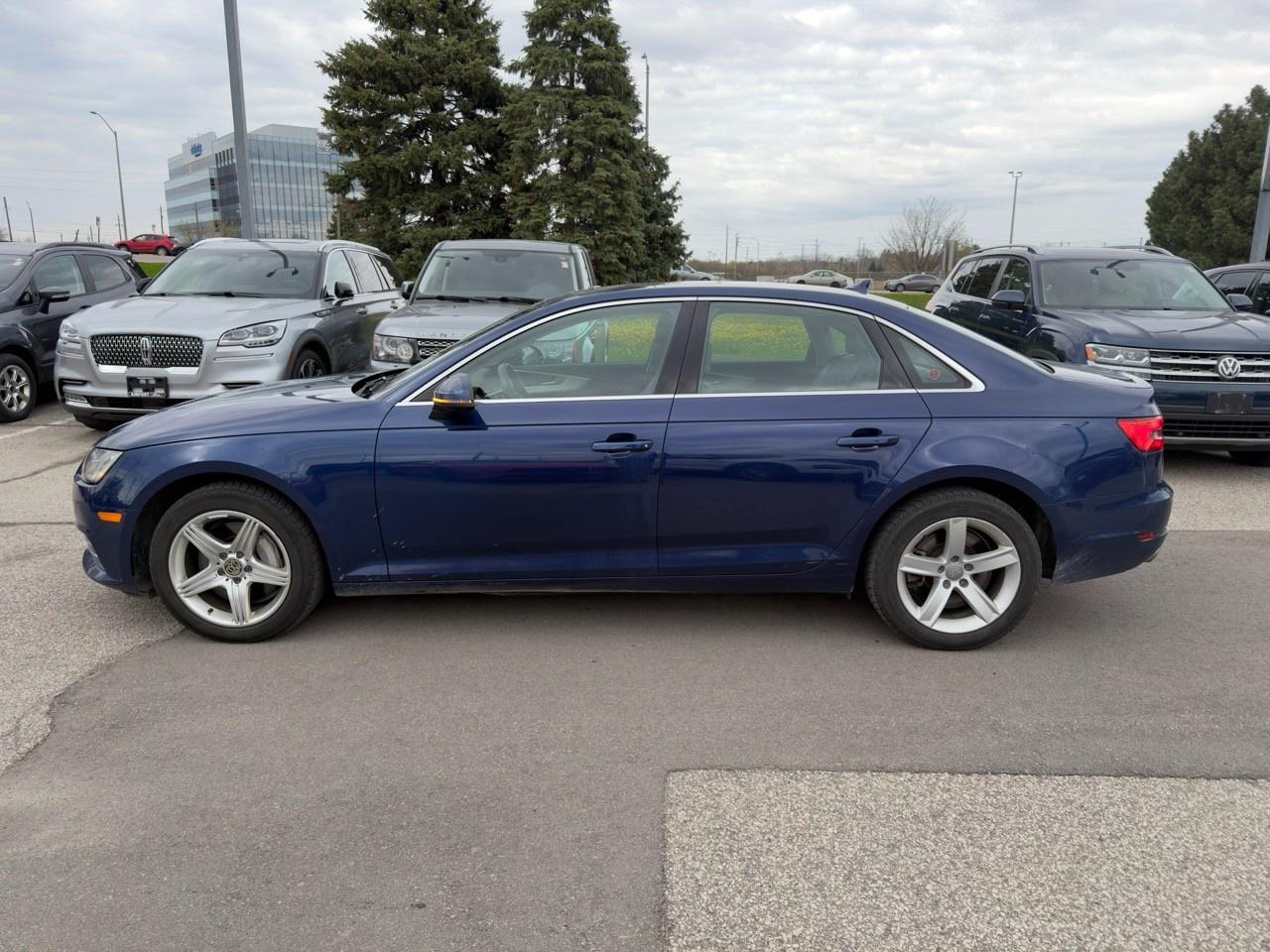 2017 Audi A4 2.0T Komfort MOONLIGHT BLUE METALLIC | BLACK LEATHER SEAT TRIM | WHLS 8J X 18 10-SPOKE DYNAMIC DESIGN Photo4