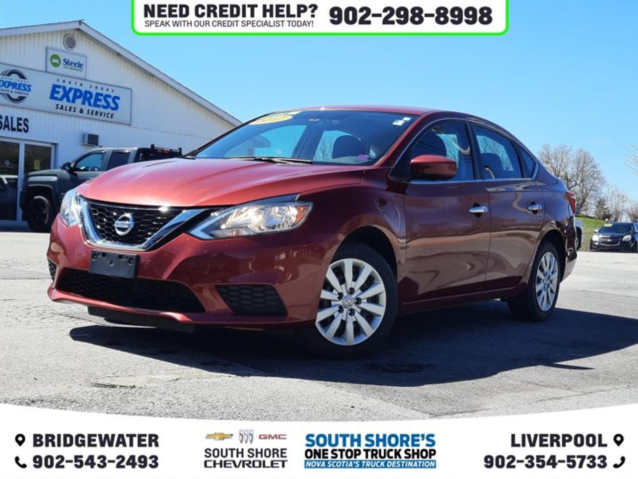 Recent Arrival! Odometer is 41699 kilometers below market average! Red 2017 Nissan Sentra 1.8 S For Sale, Bridgewater FWD CVT with Xtronic 1.8L 4-Cylinder DOHC 16V CVT with Xtronic, Cloth, 4 Speakers, ABS brakes, Brake assist, CD player, Cloth Seat Trim, Delay-off headlights, Driver door bin, Electronic Stability Control, Front anti-roll bar, Front reading lights, Front wheel independent suspension, Fully automatic headlights, Heated door mirrors, Illuminated entry, Occupant sensing airbag, Outside temperature display, Overhead console, Passenger door bin, Power door mirrors, Power steering, Rear window defroster, Remote keyless entry, Security system, Speed control, Split folding rear seat, Steering wheel mounted audio controls, Tachometer, Telescoping steering wheel, Traction control, Trip computer, Variably intermittent wipers.