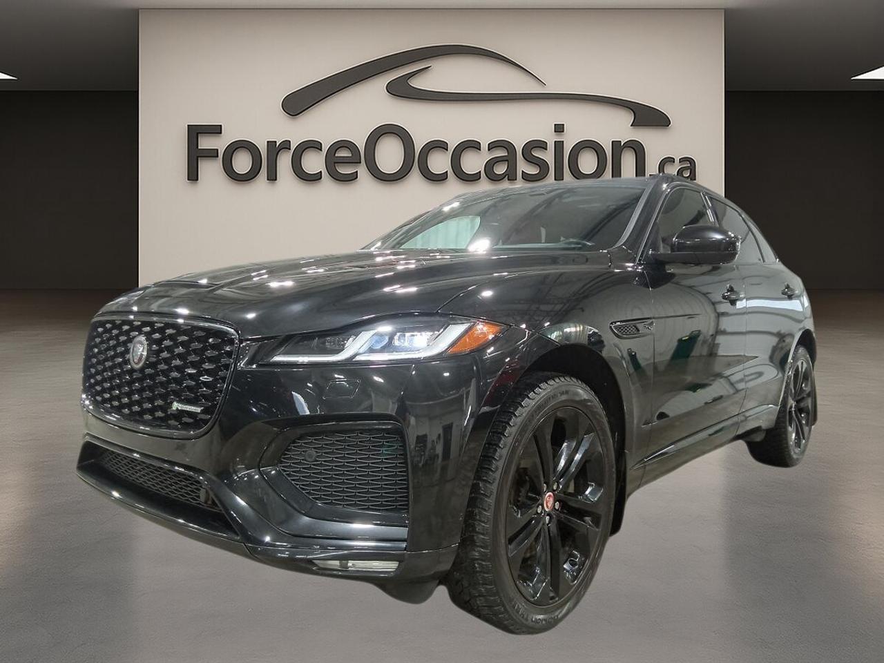 Jamais accidenté // Inspecté en 135 points

Le Jaguar F-PACE 2023 P250 R-DYNAMIC S * 247HP * CUIR * GPS * TOIT * VOLANT CHAUFF * proposé chez Kia Val-Bélair à Québec se présente dans une élégante livrée noire, avec habitacle noir et 49 867 km à lodomètre. Ce VUS usagé combine moteur 2,0 litres turbo, boîte automatique et équipement recherché pour une conduite raffinée au quotidien.

CARACTÉRISTIQUES DU F-PACE P250 R-DYNAMIC S * 247HP * CUIR * GPS * TOIT * VOLANT CHAUFF *

»» Moteur turbo 2,0 litres de 247 chevaux  
»» Transmission automatique à 8 rapports  
»» Toit panoramique avec section ouvrante en verre  
»» Volant chauffant et navigation intégrée  

CARACTÉRISTIQUES DE SÉCURITÉ AVANCÉES

»» Avertissement de sortie de voie intégré  
»» Surveillance des angles morts incluse  
»» Caméra de recul pour manoeuvres précises  
»» Coussins gonflables latéraux et latéraux de tête  

PERFORMANCE ET EFFICACITÉ

»» Moteur 2,0 litres sans plomb turbocompressé  
»» Puissance de 247 chevaux  
»» Boîte automatique à 8 vitesses  
»» Différentiel à glissement limité inclus  

CONFORT

»» Sièges avant chauffants pour lhiver  
»» Siège conducteur à réglage électrique  
»» Siège passager avant à réglage électrique  
»» Climatisation automatique à deux zones  

TECHNOLOGIE ET CONNECTIVITÉ

»» Système de navigation GPS intégré  
»» Intégration Bluetooth pour appels et audio  
»» Commandes audio montées au volant  
»» Démarrage par bouton-poussoir pratique  

ESPACE DE CHARGEMENT

»» Hayon électrique pour accès simplifié  
»» Ouverture à distance du coffre  
»» Couvre-bagage inclus  
»» Banquette utilitaire et accès arrière pratique  

APPRÉCIÉ DES AUTRES PROPRIÉTAIRES

»» Conduite stable et direction bien calibrée  
»» Habitacle silencieux sur route et autoroute  
»» Position de conduite élevée et confortable  
»» Présentation intérieure soignée et moderne  

GARANTIE

»» Garantie légale seulement  
»» Garantie dusage  
»» Garantie de durée raisonnable  
»» Garantie contre les vices cachés  

Ce Jaguar F-PACE 2023 P250 R-DYNAMIC S * 247HP * CUIR * GPS * TOIT * VOLANT CHAUFF * mise sur une présentation sobre, un équipement complet et une motorisation turbo bien adaptée aux trajets de tous les jours. Avec ses 4 portes, ses rétroviseurs chauffants, son toit panoramique et son hayon électrique, il offre un ensemble cohérent et bien équipé.

Le NIV de ce Jaguar F-PACE P250 R-DYNAMIC S * 247HP * CUIR * GPS * TOIT * VOLANT CHAUFF * 2023 est le SADCT2EX5PA708775 .

Garantie prolongée disponible, livraison en 48h