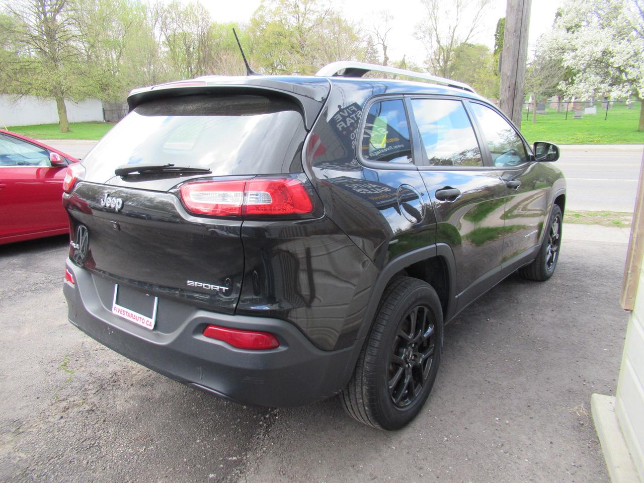 2014 Jeep Cherokee Sport Photo