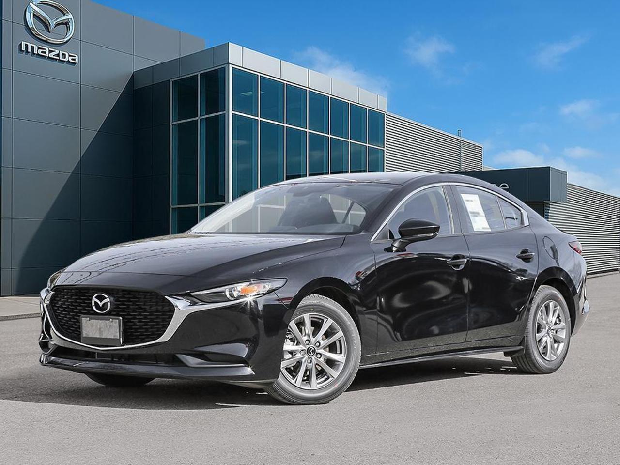 <p>Introducing the stylish black 2026 Mazda3 GX, featuring a refined automatic transmission and front-wheel drive for a balanced ride and handling. This elegant sedan stands out with its striking Jet Black Mica finish, complemented by sleek alloy wheels and a modern black interior, creating a cohesive look and feel.</p><p>Inside, the cabin is thoughtfully designed with metal-look instrument panel trims, providing a modern touch that enhances its sophisticated atmosphere. Comfort is a priority with features like heated front seats, air conditioning, and power windows, ensuring a pleasurable driving experience. Remote keyless entry offers convenience, while smart device integration keeps you connected on the go.</p><p>Technology and safety are forefront with cutting-edge features such as a backup camera, Bluetooth connection, adaptive cruise control, lane assist, and brake assist, all working together to enhance your driving confidence and safety.</p><p>Ideal for tech-savvy individuals and families who value safety and comfort in their daily commute or road trips, the 2026 Mazda3 GX at Cobourg Mazda is the perfect choice. Take advantage of our special offers, including 3.49% Lease APR, a 1% Owner Loyalty discount, and $500 Event Funds. Contact us today to learn more and schedule a test drive!</p>